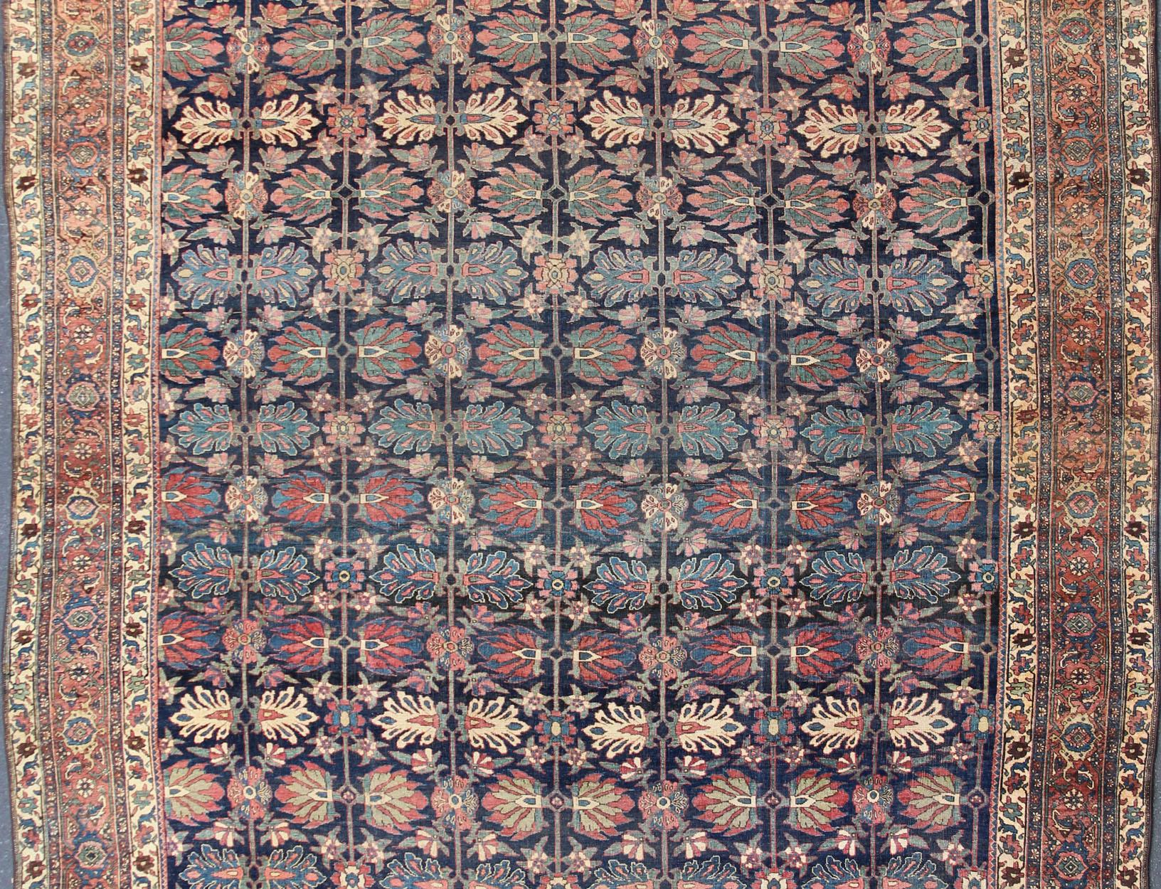 Large antique Persian bidjar rug in blue background and alternating floral pattern, Keivan Woven Arts / TRA-8051. Large antique Bidjar Late 19th Century

Distinguished primarily by their dense, durable weaves, Bidjar carpets are fantastic