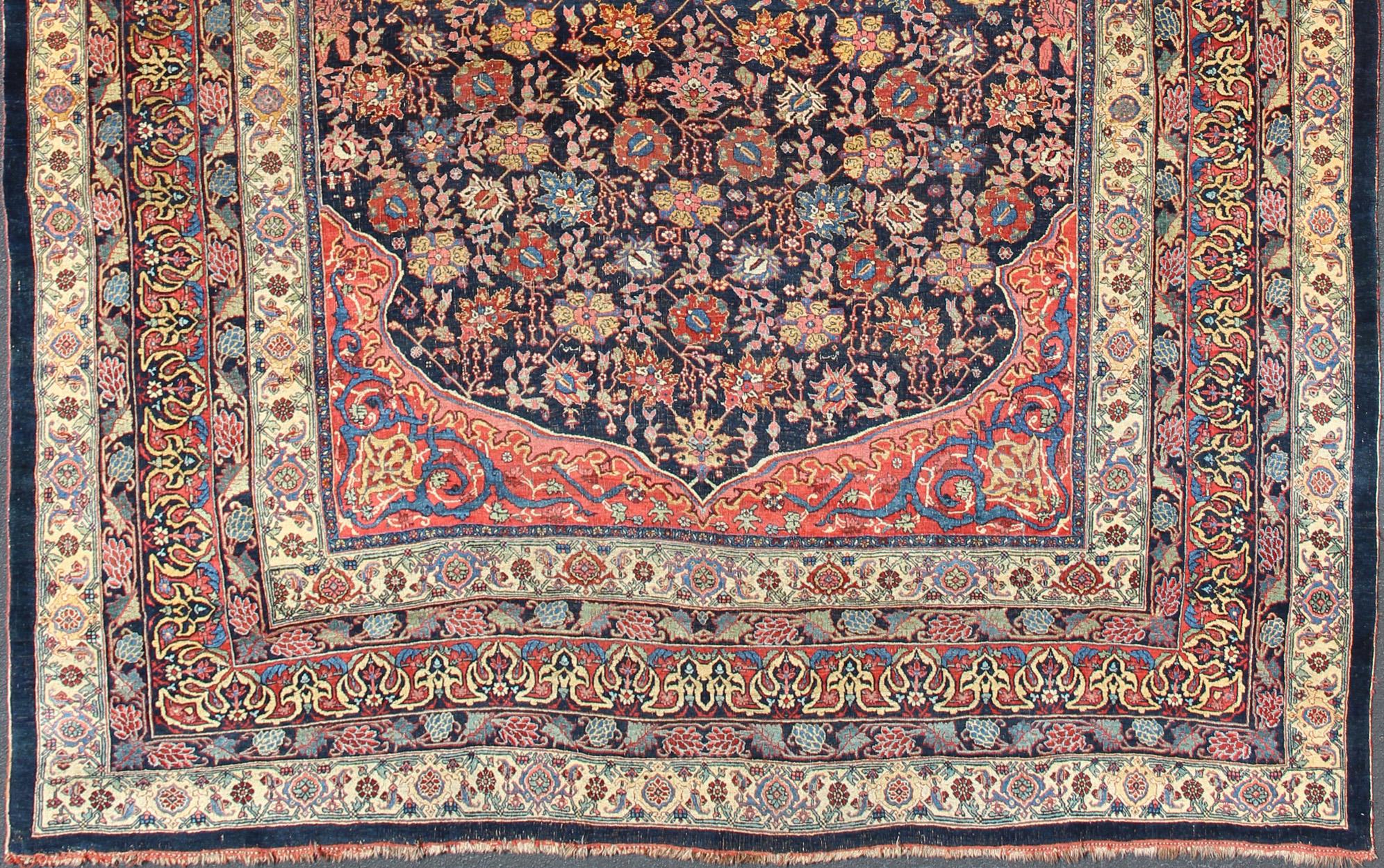 Tabriz Grand tapis persan ancien Bidjar avec des fleurs colorées et un champ bleu marine en vente