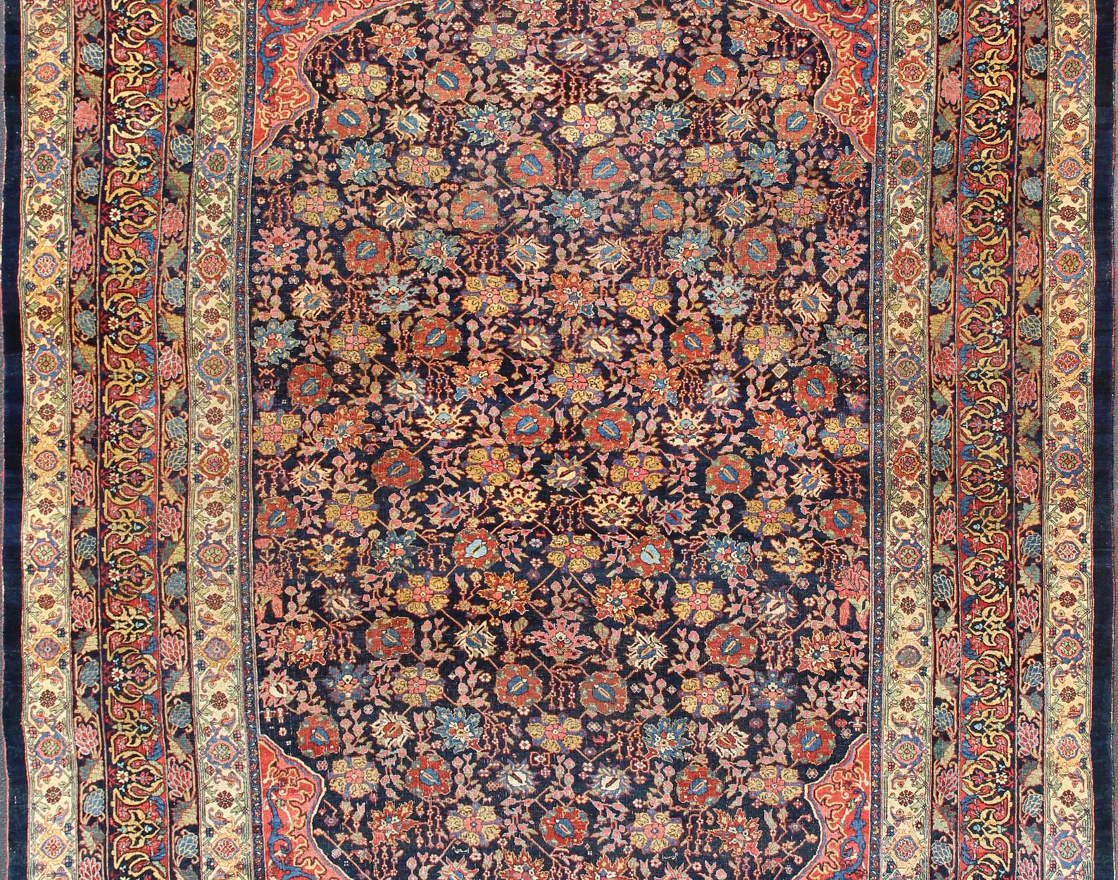 Hand-Knotted Large Antique Persian Bidjar Rug with All-Over colorful Florals & Navy Field For Sale
