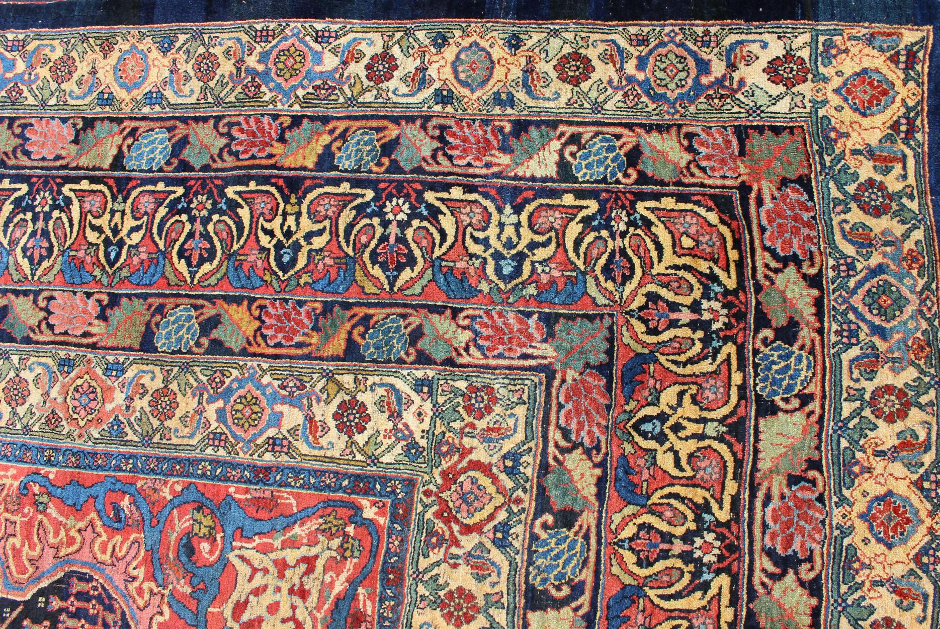 Large Antique Persian Bidjar Rug with All-Over colorful Florals & Navy Field In Excellent Condition For Sale In Atlanta, GA