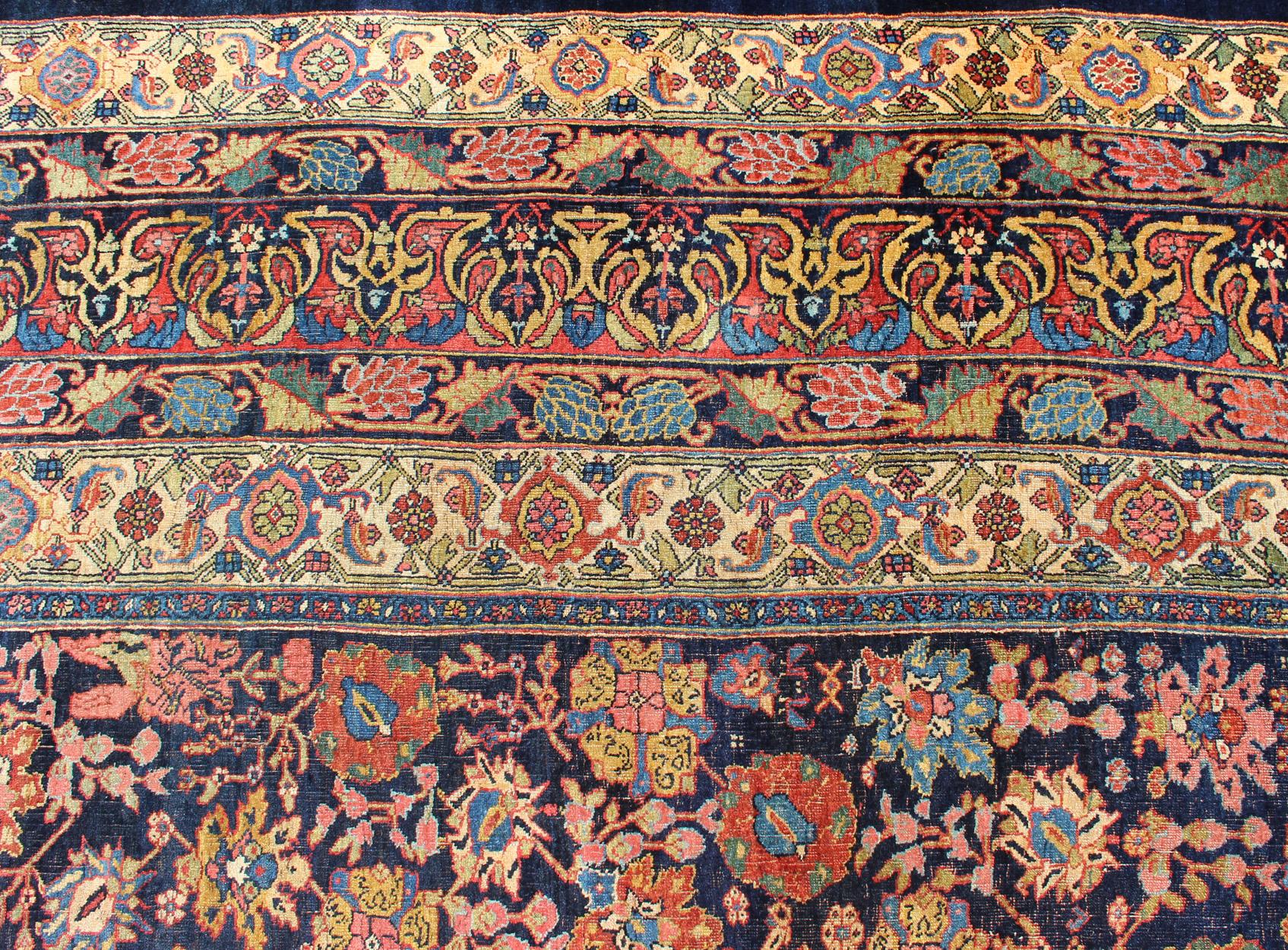 Late 19th Century Large Antique Persian Bidjar Rug with All-Over colorful Florals & Navy Field For Sale