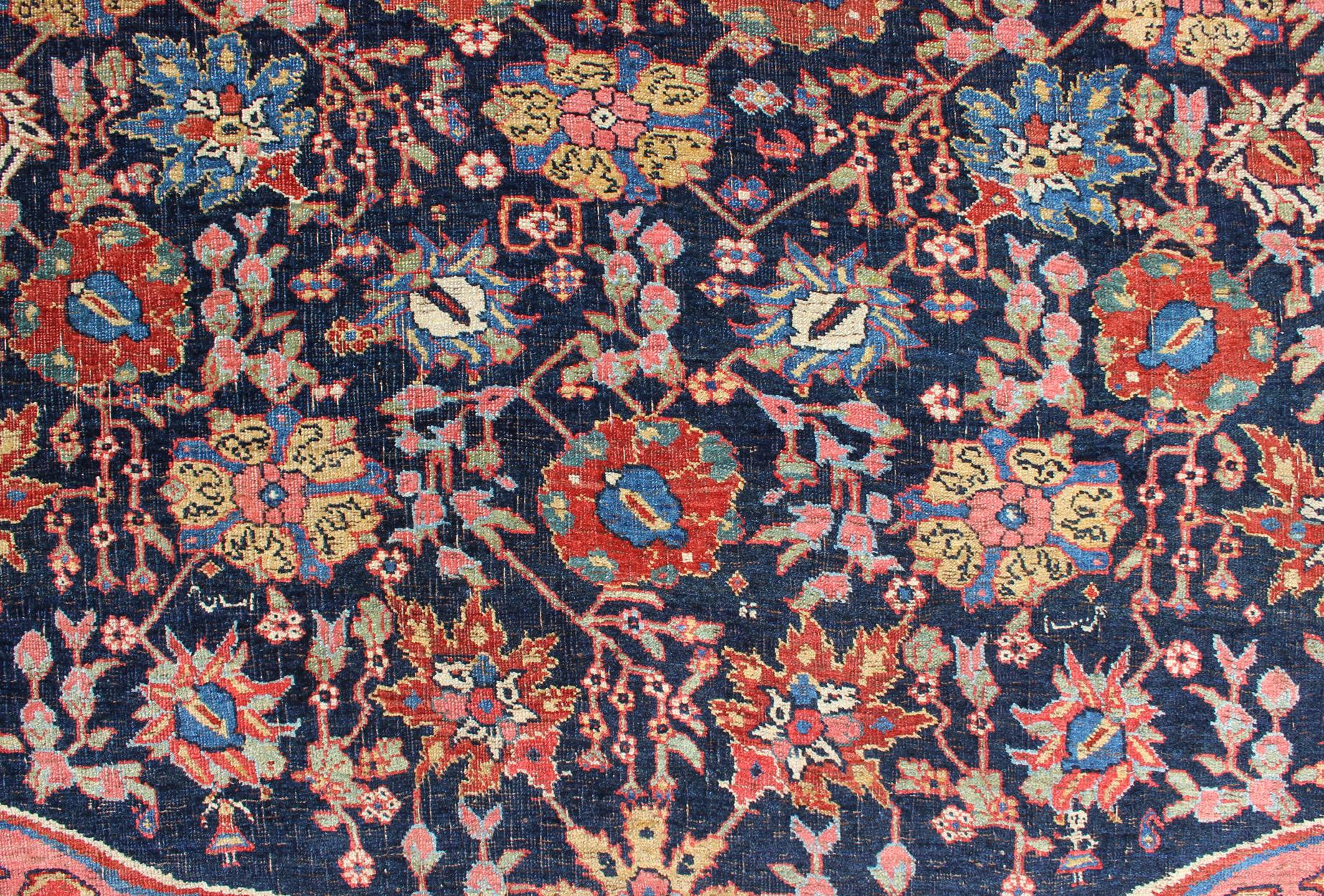 Wool Large Antique Persian Bidjar Rug with All-Over colorful Florals & Navy Field For Sale