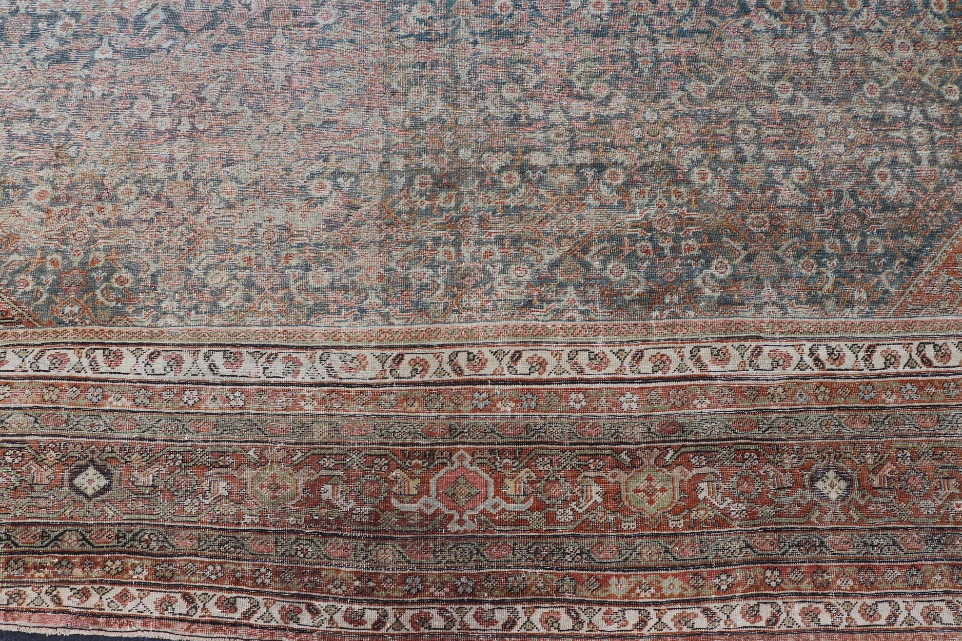 20th Century Large Antique Persian Distressed Sultanabad with All-Over Herati Design For Sale