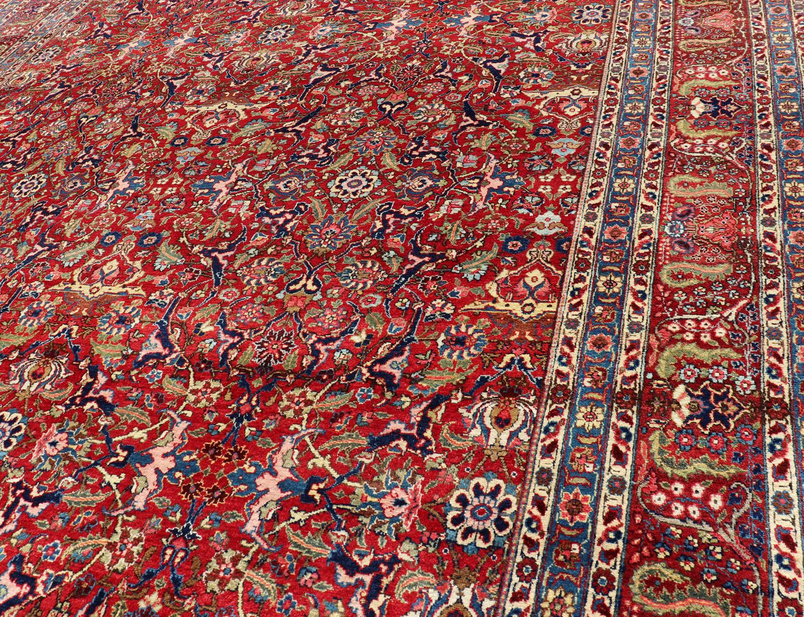 Wool Large Antique Persian Fine Weave Tabriz in Red Background & L.Blue Guard Borders For Sale