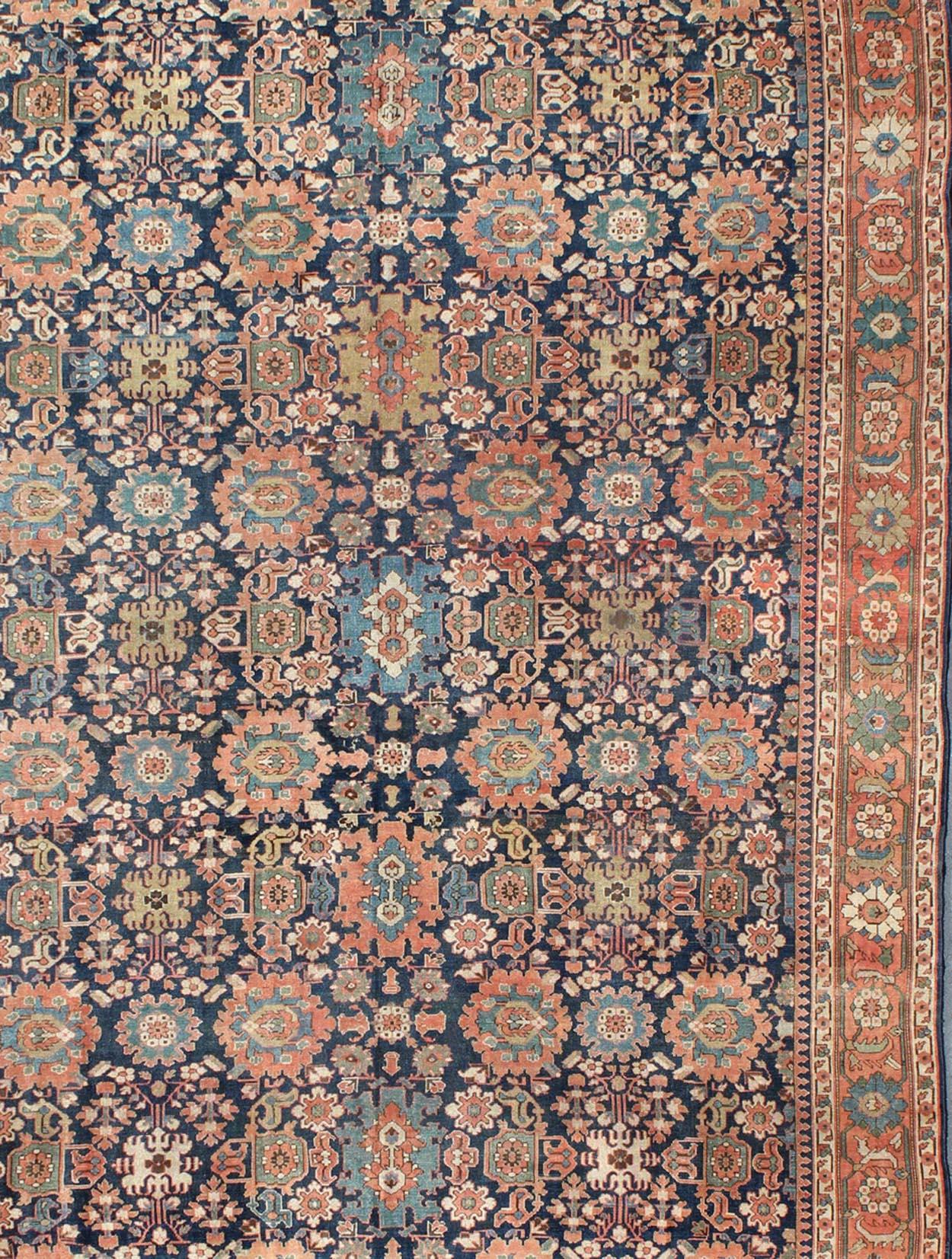 Hand-Knotted Very Large Antique Persian Hamedan Rug with Blossom Design in Blue Background For Sale