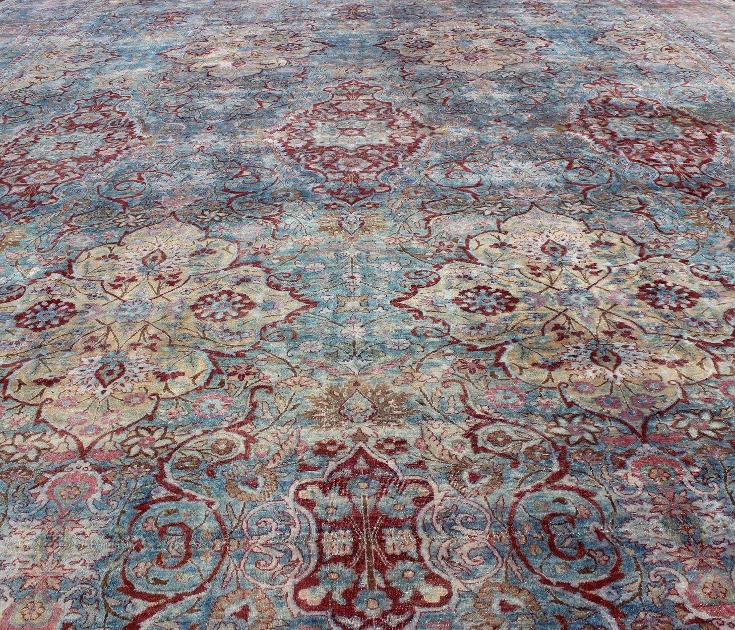 Large Antique Persian Kerman Rug with Medallions in Light Blue, Red and Pink For Sale 1