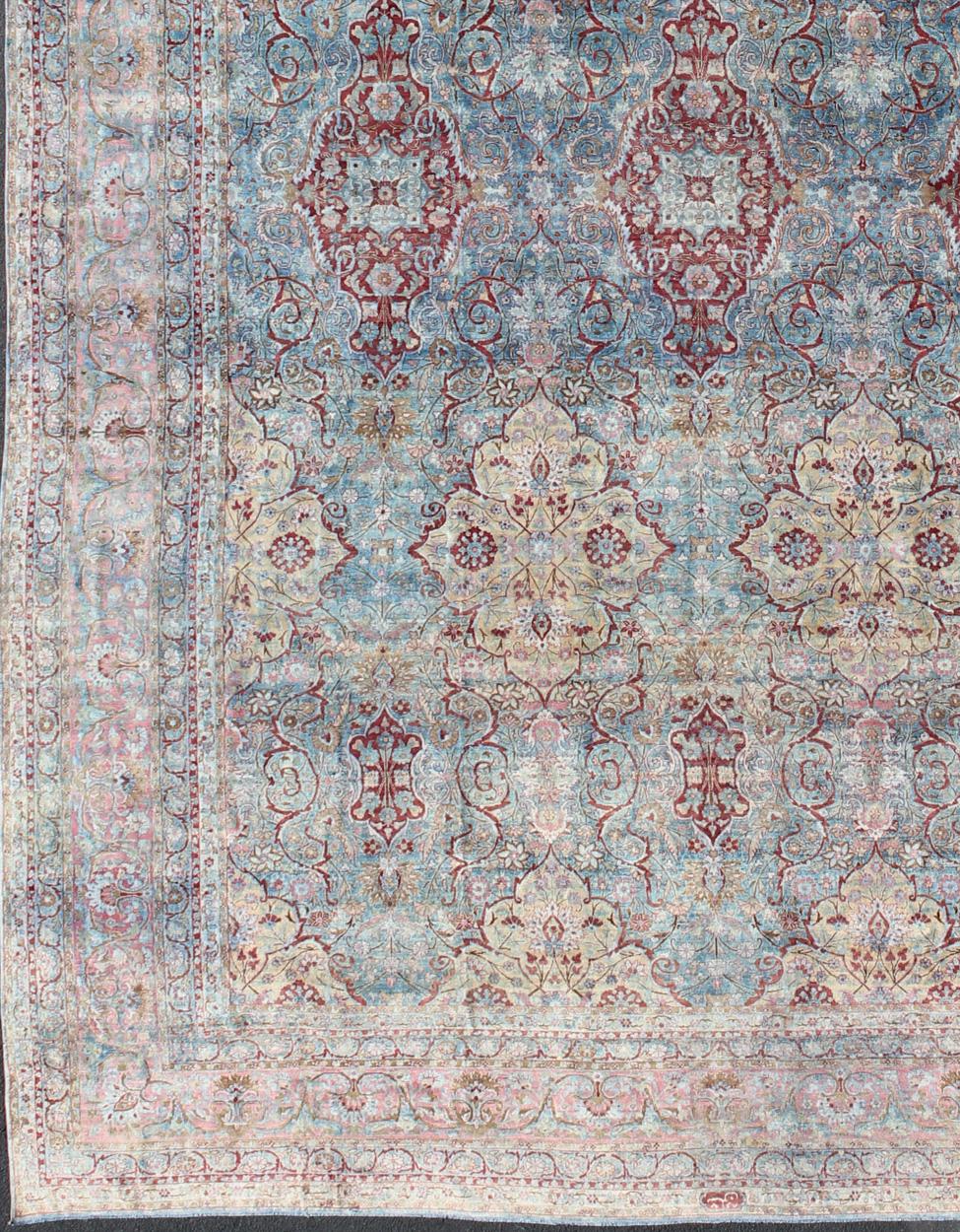 Large Antique Persian Kerman Rug with Medallions in Light Blue, Red and Pink. Large antique Persian Kerman rug with vertical medallions in light blue, red and pink. Keivan Woven Arts / rug 18-0201, country of origin / type: Iran / Kerman, circa