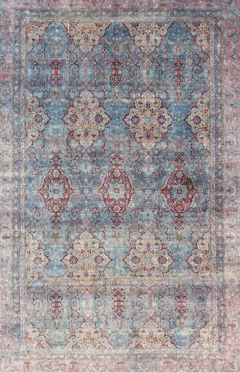 light blue and pink rug