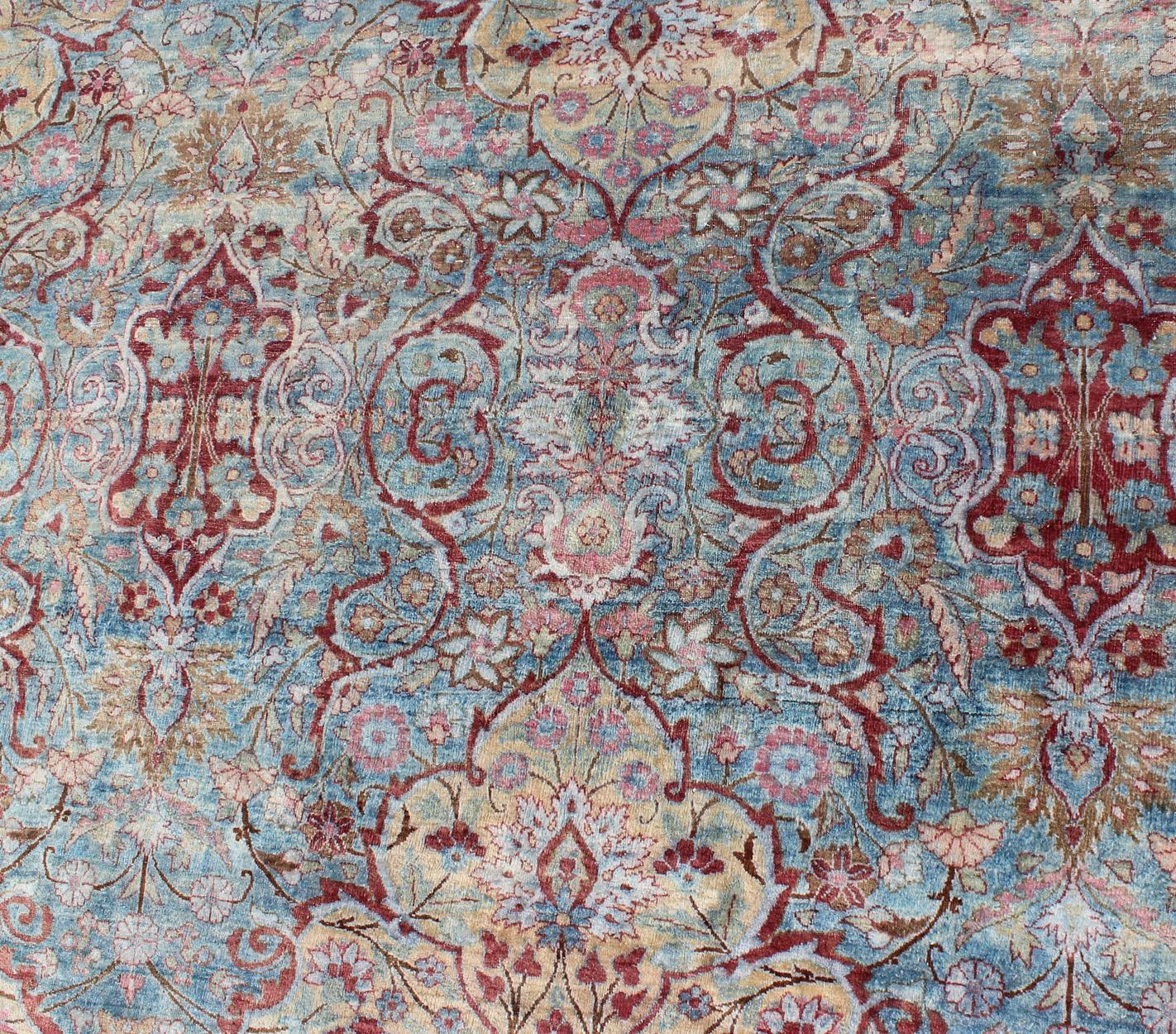 Hand-Knotted Large Antique Persian Kerman Rug with Medallions in Light Blue, Red and Pink For Sale