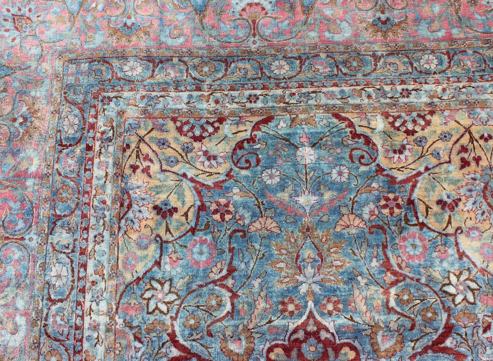 Large Antique Persian Kerman Rug with Medallions in Light Blue, Red and Pink In Good Condition For Sale In Atlanta, GA
