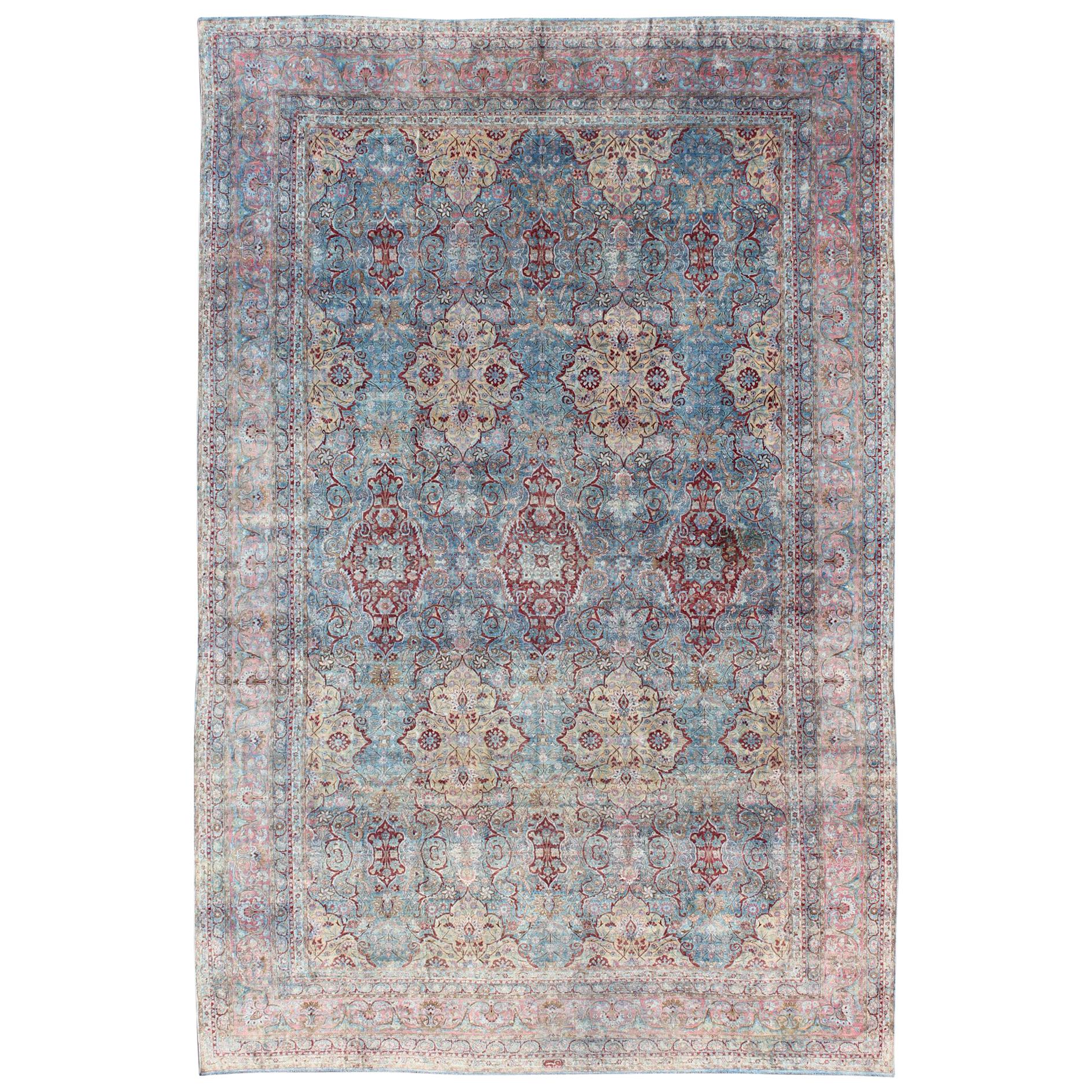 Large Antique Persian Kerman Rug with Medallions in Light Blue, Red and Pink For Sale