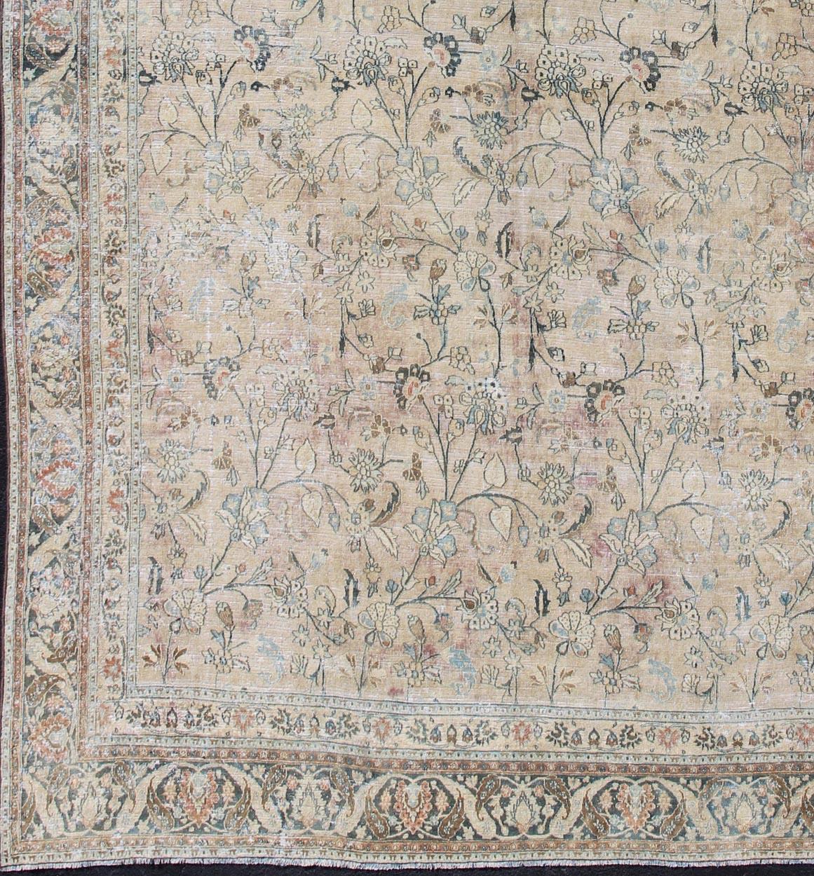 Earth tones large Antique Persian Khorassan with All-Over Earth Tones in neutral tones and Neutral background with Brown, Blue. Sub floral design Khorassan antique rug from Persia in natural color Palette. Keivan Woven Arts / rug 19-0605, country of