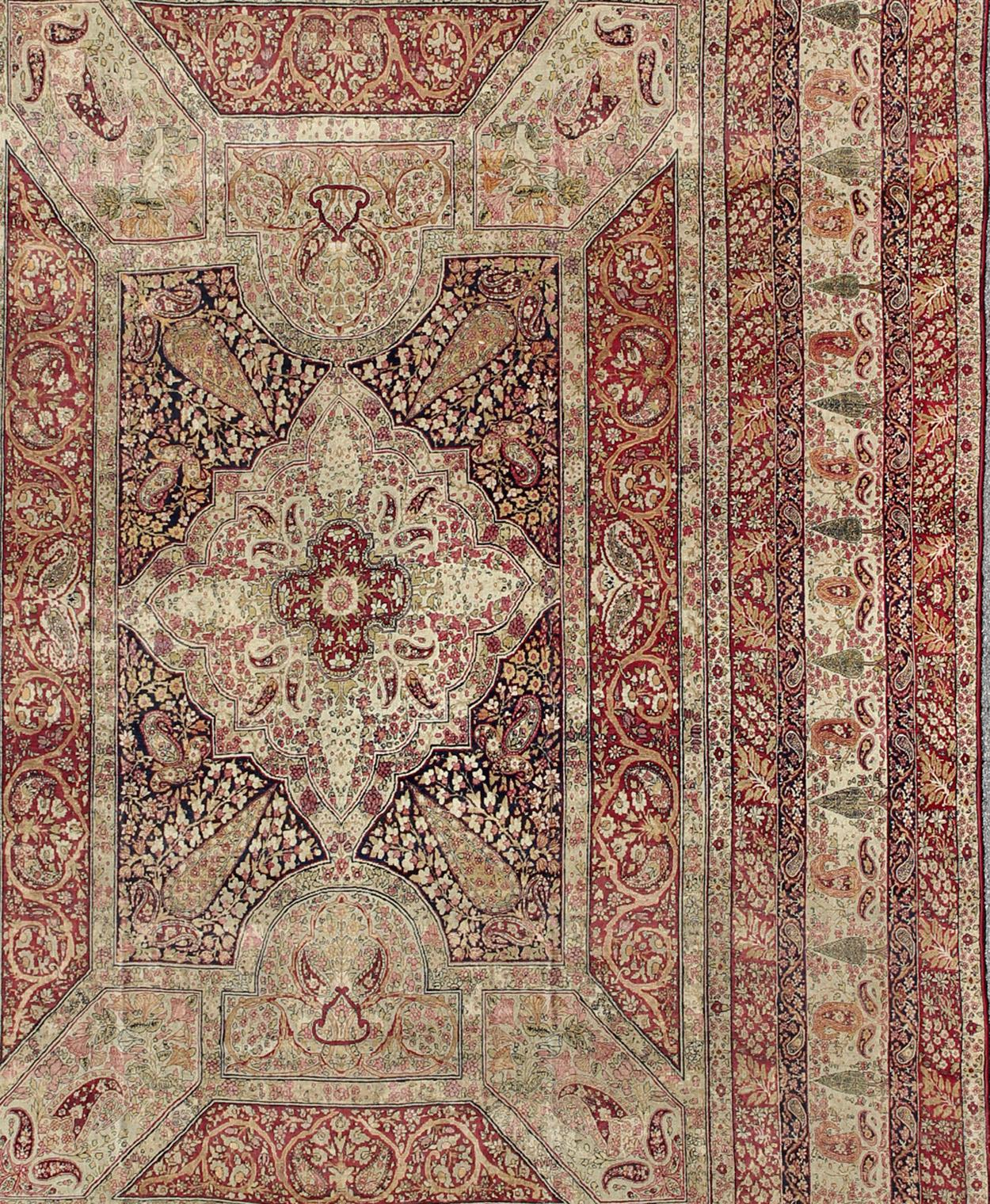 Large antique Persian Lavar Kerman large rug with incredible details, rug / E-1210. Antique large Persian rug. Antique Persian Lavar Kerman, large rug with intricate details
This magnificent antique Lavar Kerman carpet is a stunning achievement of