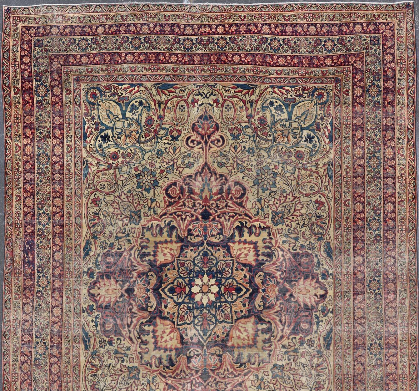 Large Antique Persian Lavar Kerman Rug with Blooming Central Medallion For Sale 10