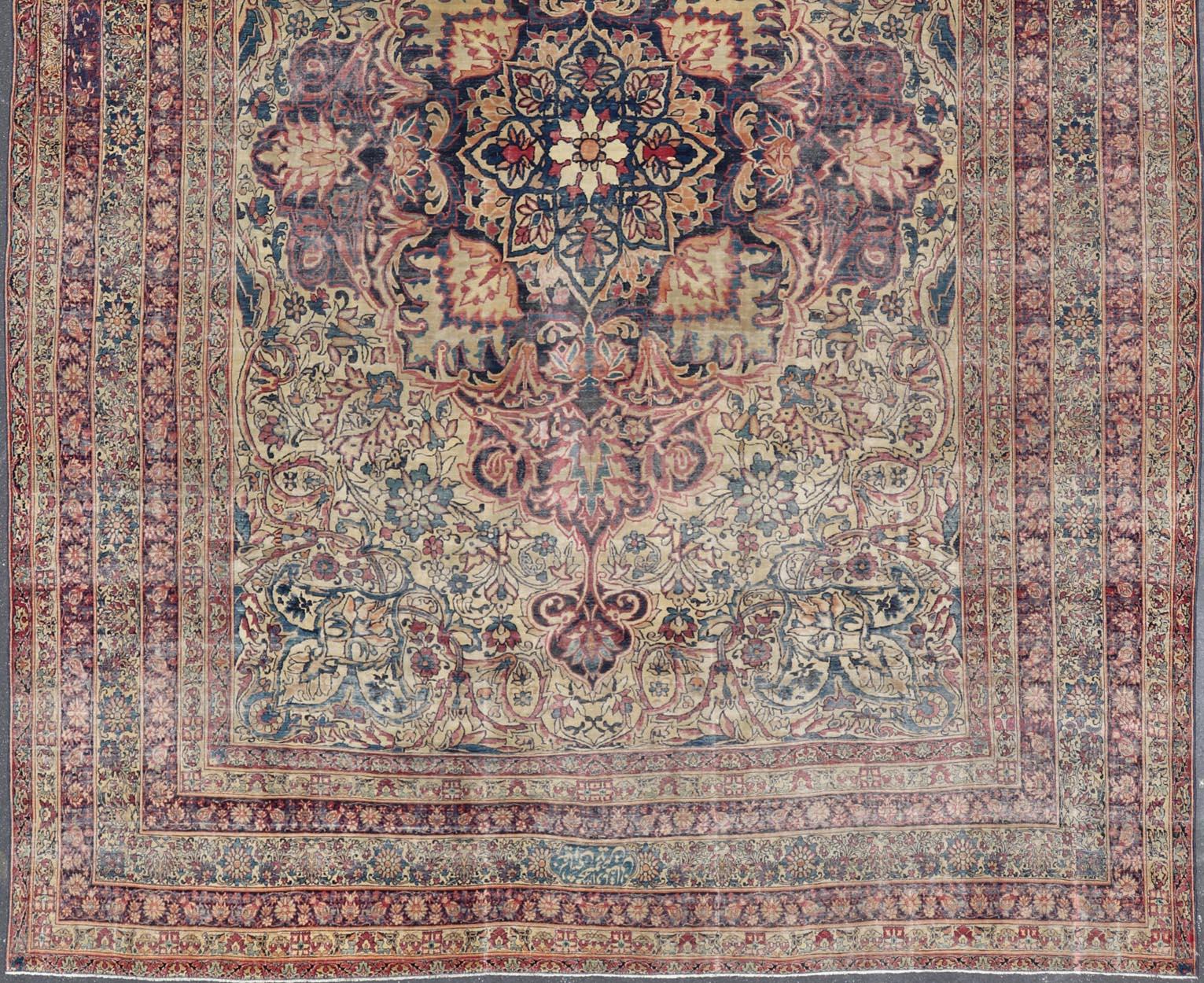 Large Antique Persian Lavar Kerman Rug with Blooming Central Medallion For Sale 12