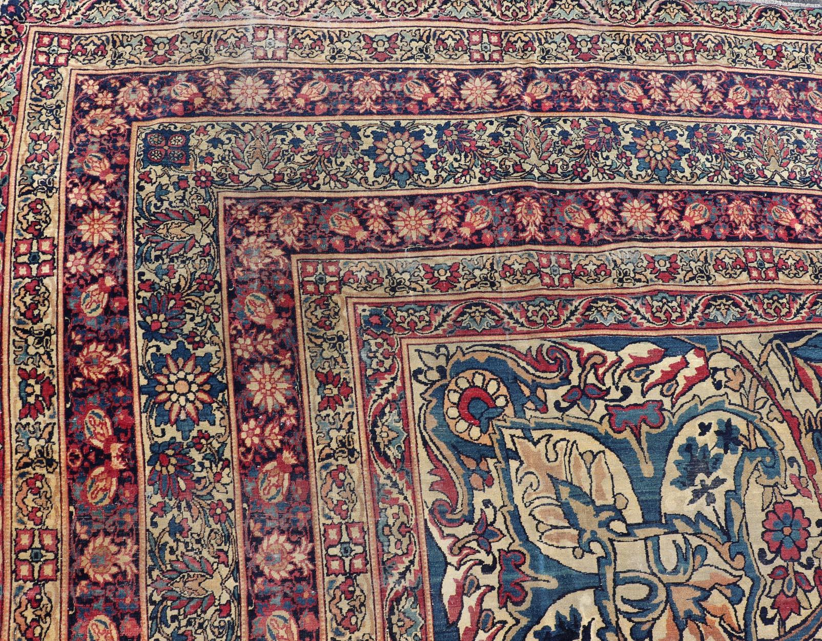 Large Antique Persian Lavar Kerman Rug with Blooming Central Medallion For Sale 2