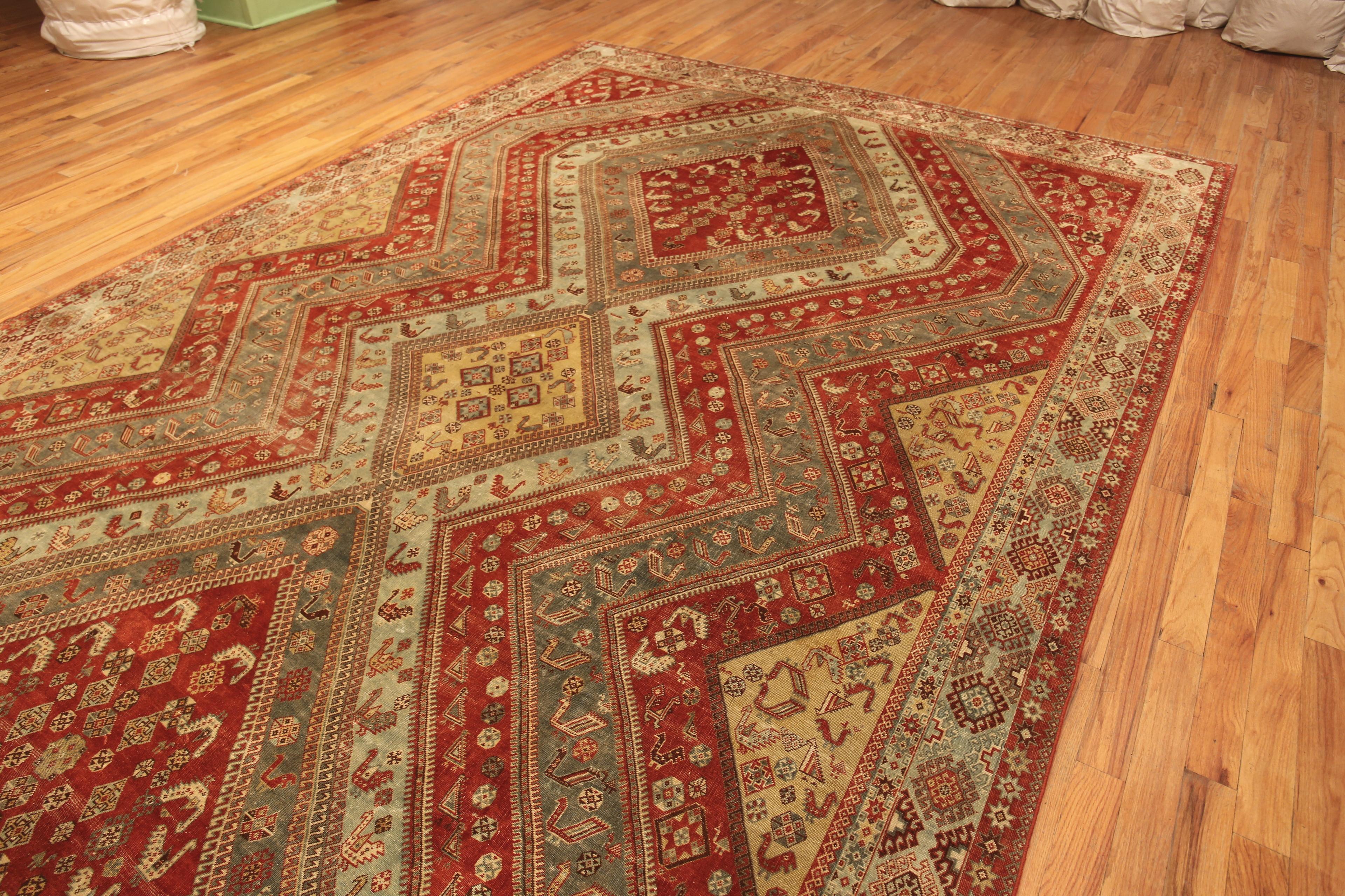 Large Antique Persian Qashqai Rug, Country of origin: Persia, Circa date: 1900. Size: 9 ft 7 in x 16 ft 2 in (2.92 m x 4.93 m)