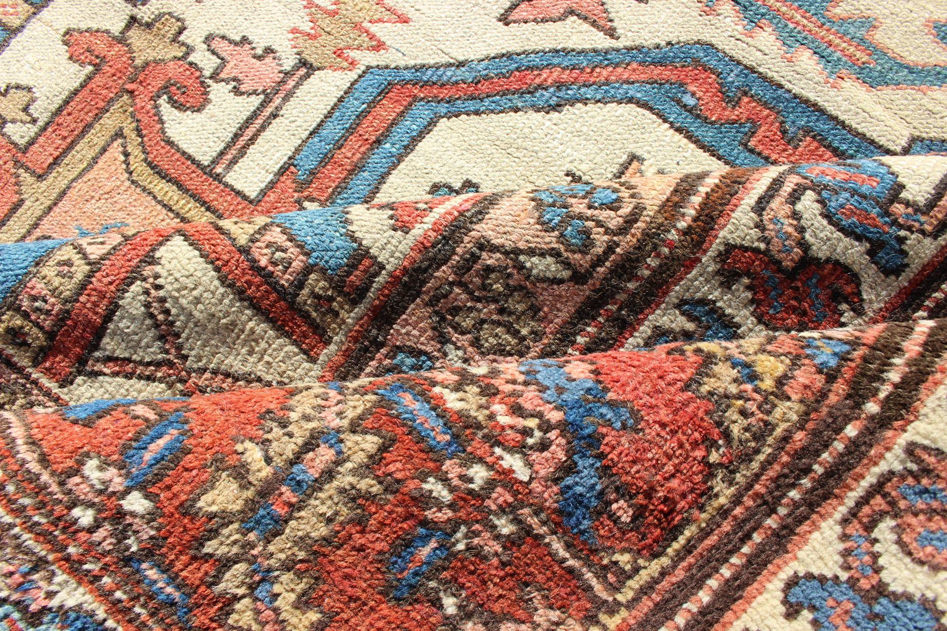 Hand-Knotted Over Size Antique Persian Serapi Rug with Stretched Geometric Medallion For Sale