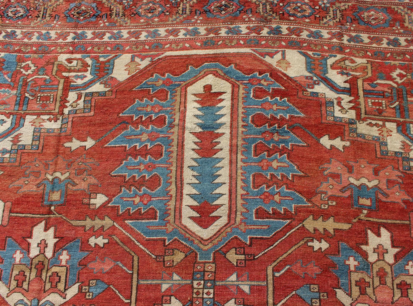 Wool Over Size Antique Persian Serapi Rug with Stretched Geometric Medallion For Sale