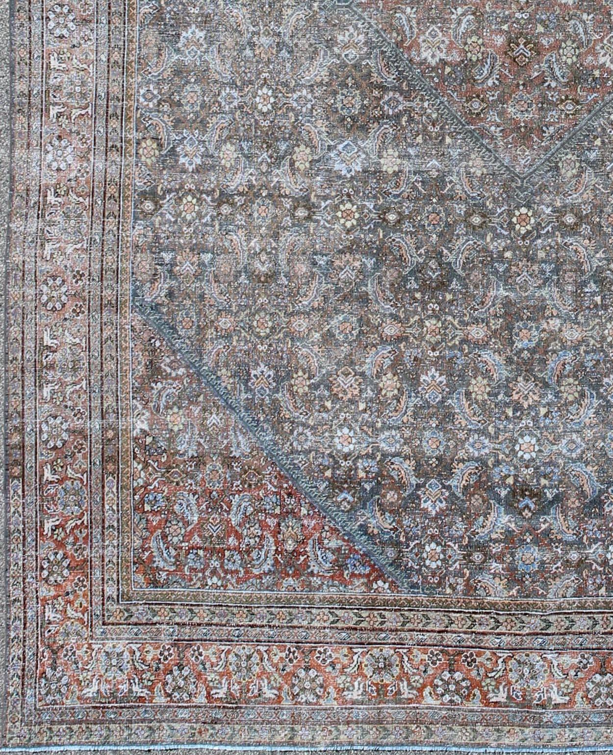  Large Antique Persian Sultanabad Mahal rug with sub Geometric All Over design in variegated Gray Green background and coral border. Keivan Woven Arts / rug SUS-1803-220, country of origin / type: Iran / Sultanabad, circa 1910.
Measures: 12'1 x