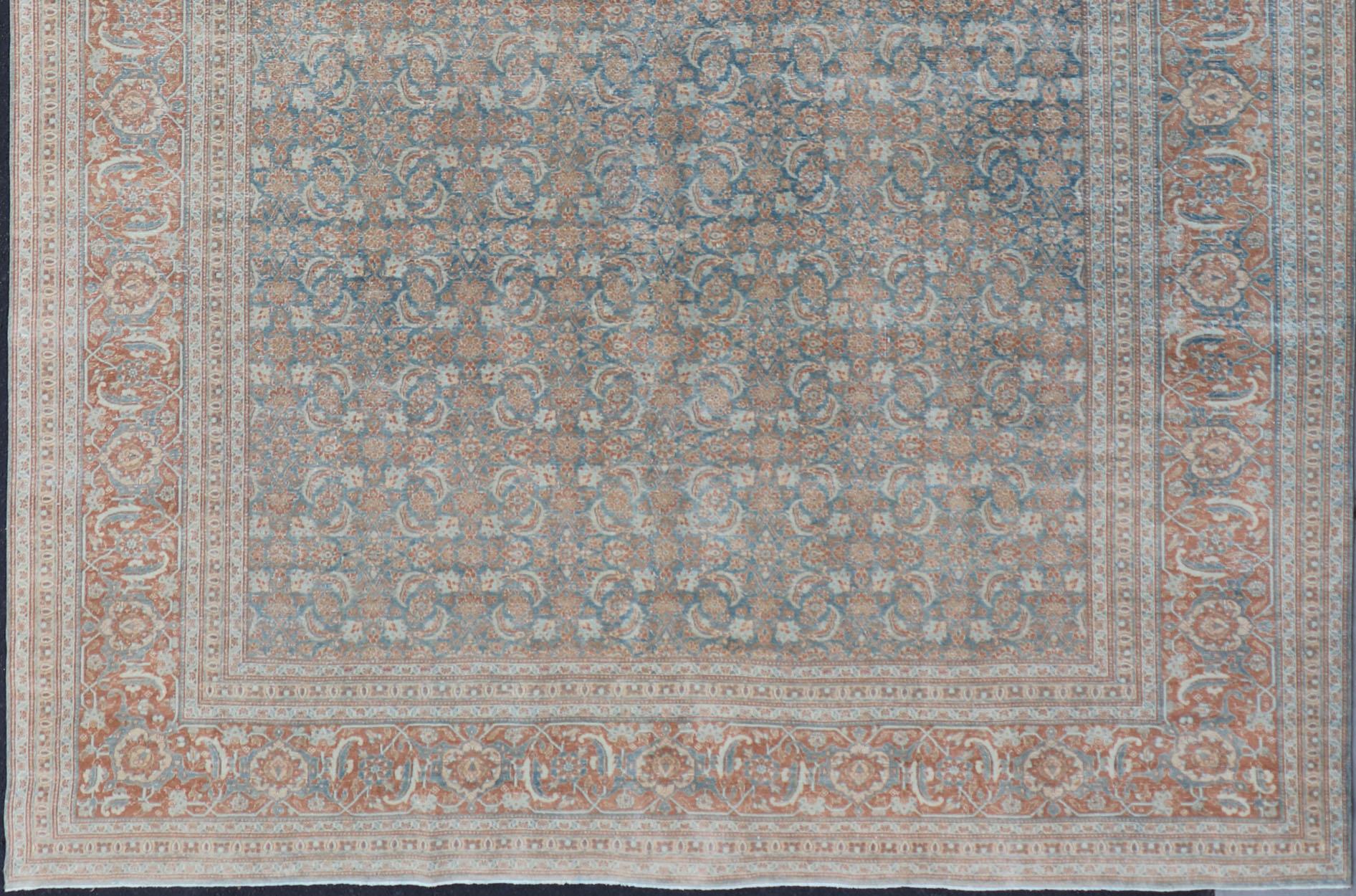 Antique Persian large distressed Tabriz rug with all over Herati and geometric design in blue tones. Blue, gray, orange red, taupe, tan and brown geometric Persian Tabriz rug, rug EMB-8514, country of origin / type: Iran / Tabriz, circa