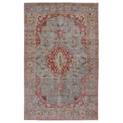 Grande tappeto Tabriz persiano antico in lana con grande disegno a medaglione floreale