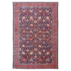 Grand tapis persan ancien de Tabriz avec motifs sous-géométriques et colorés