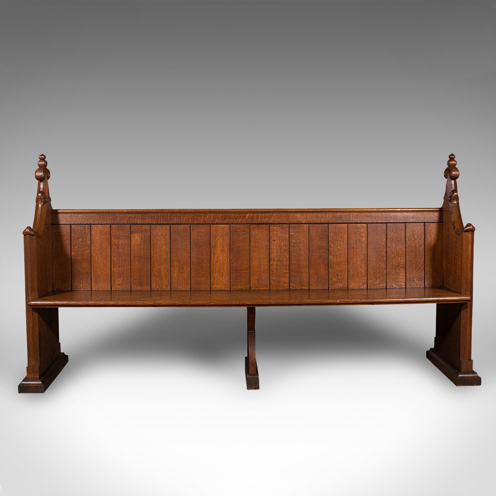 This is a large antique pew. A Scottish, oak ecclesiastical bench seat with Pugin-esque taste, dating to the early Victorian period, circa 1850.

Superb in proportion and finish, with overtones of Augustus Pugin's gothic revival