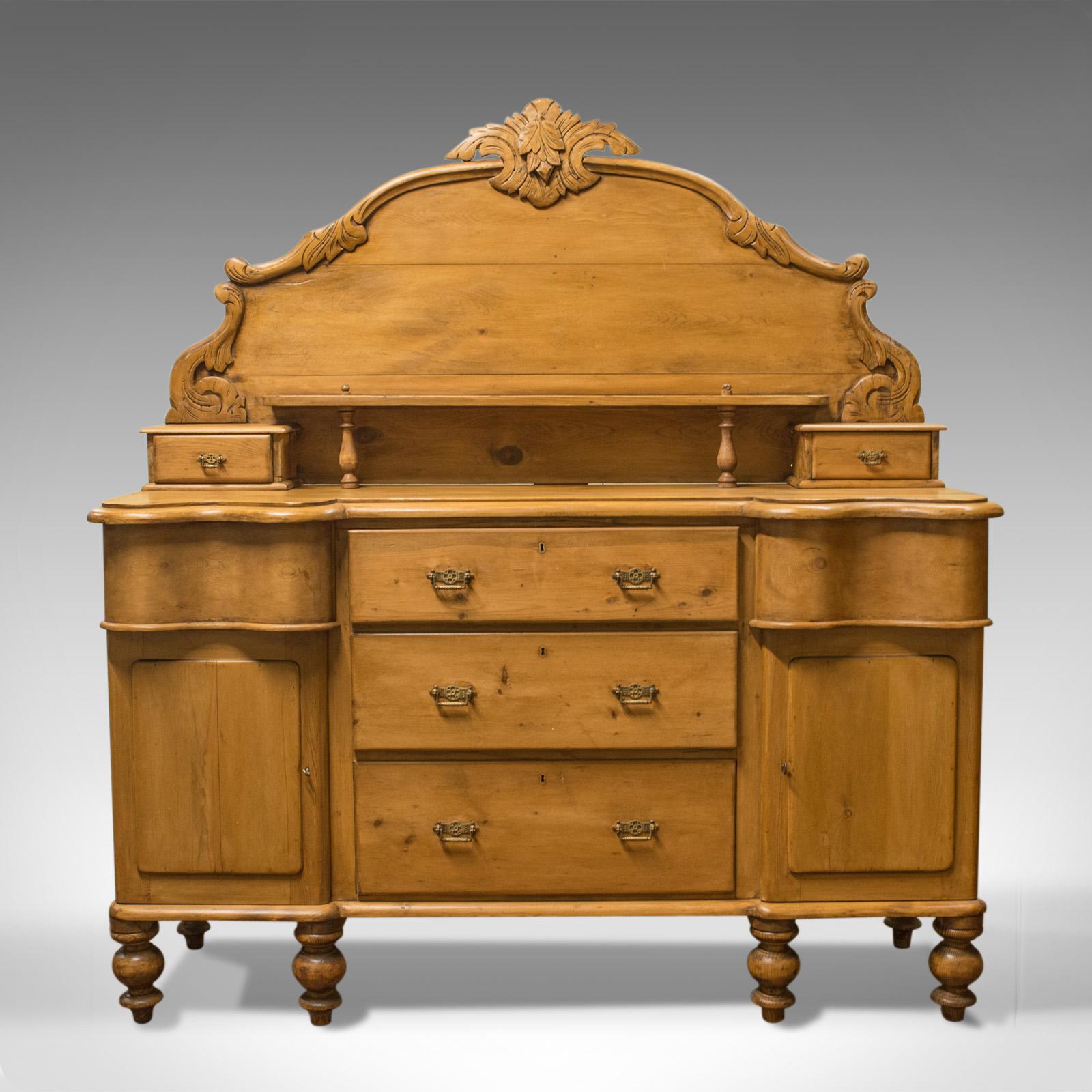 This is a large, antique pine sideboard. A French, late 19th century dining room buffet cabinet, circa 1900.

Crafted from generous stocks of antique pine
Displaying rich honey hues in a wax polished finish
Showing fine grain interest and a