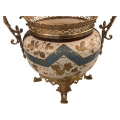 Large antique porcelain center piece/ vase in bronze dore frame