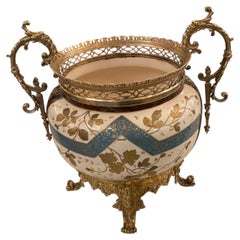 Large antique porcelain center piece/ vase in bronze dore frame
