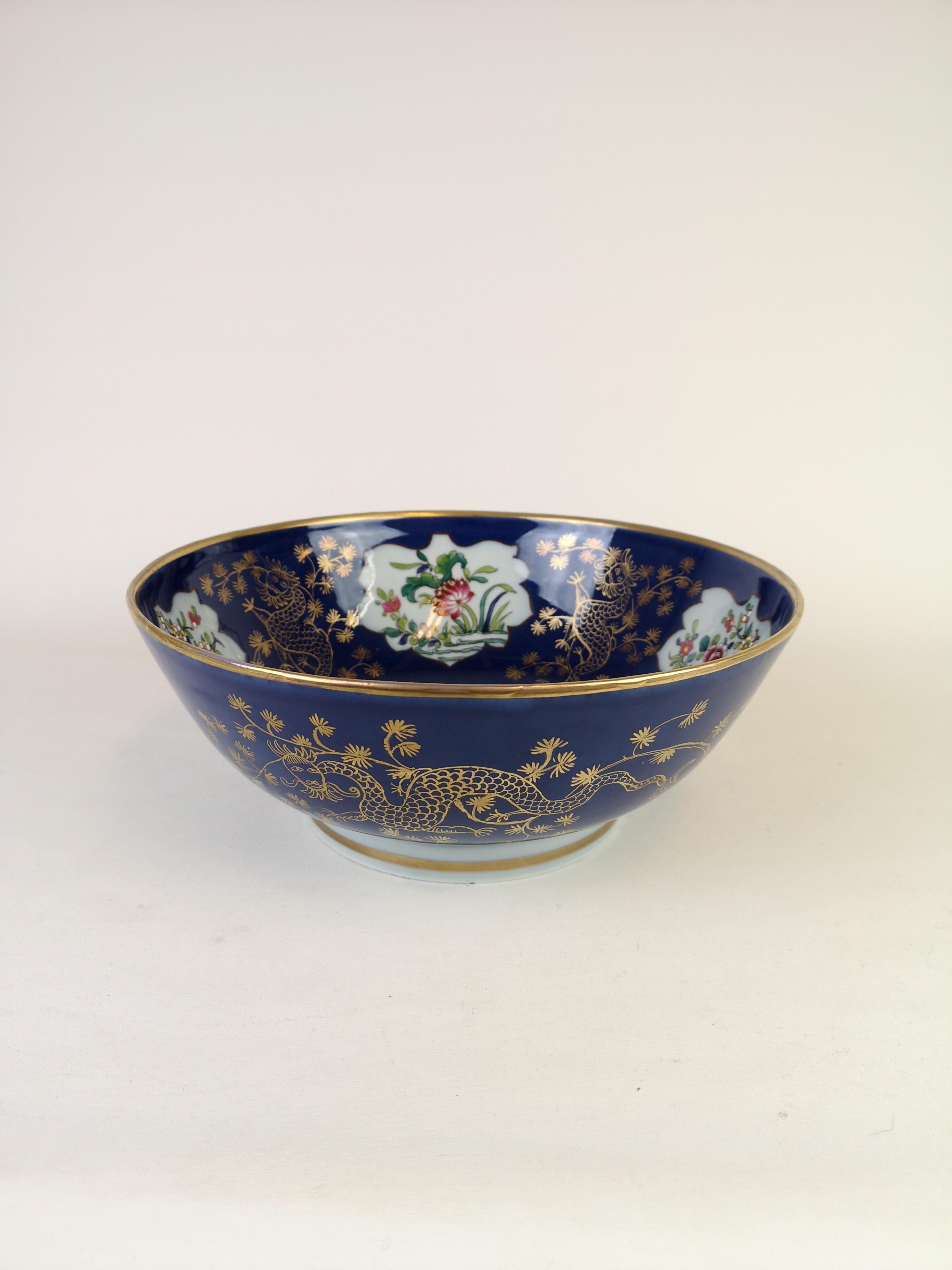 This bowl is made with high quality. It was made by the best porcelain makers and painters in France to imitate the chines porcelain. This blue bowl is made with golden paint and incredible fine art work inside of the bowl. Made in the late 1900 or