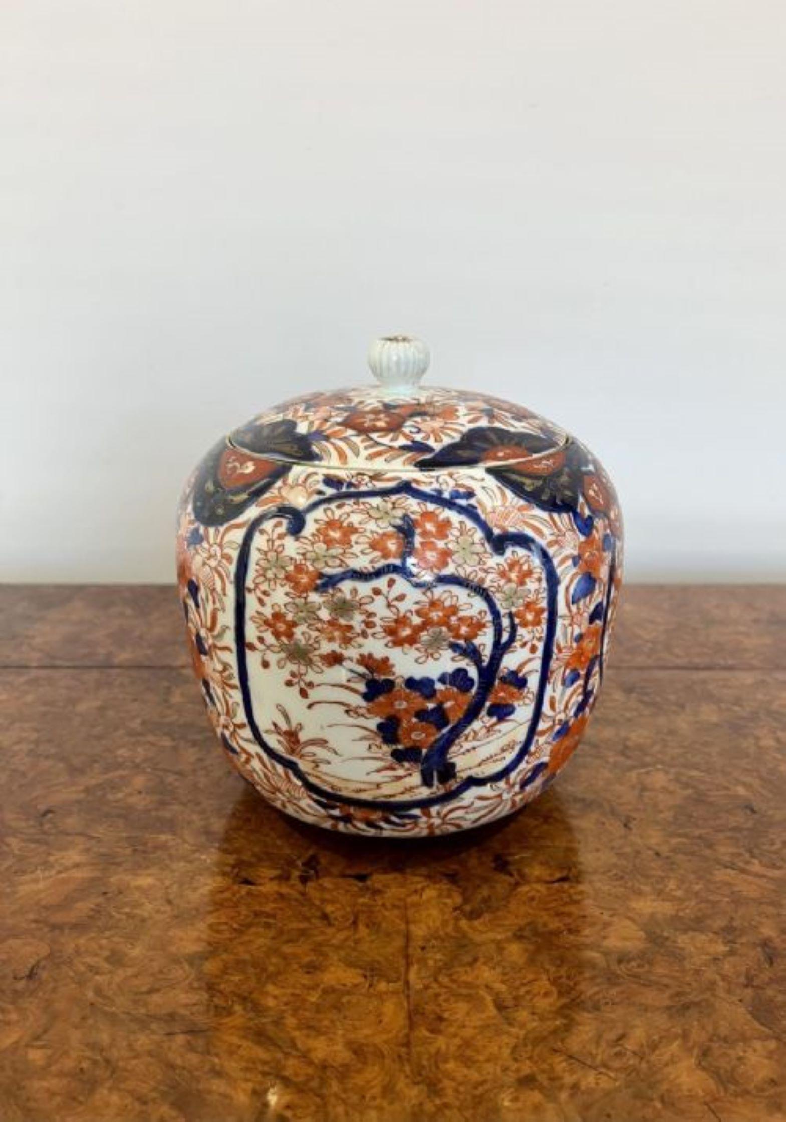 Large antique quality Japanese imari lidded ginger jar having a quality antique Japanese imari lidded ginger jar with wonderful hand painted decoration in blue, red, white and gold colours. 