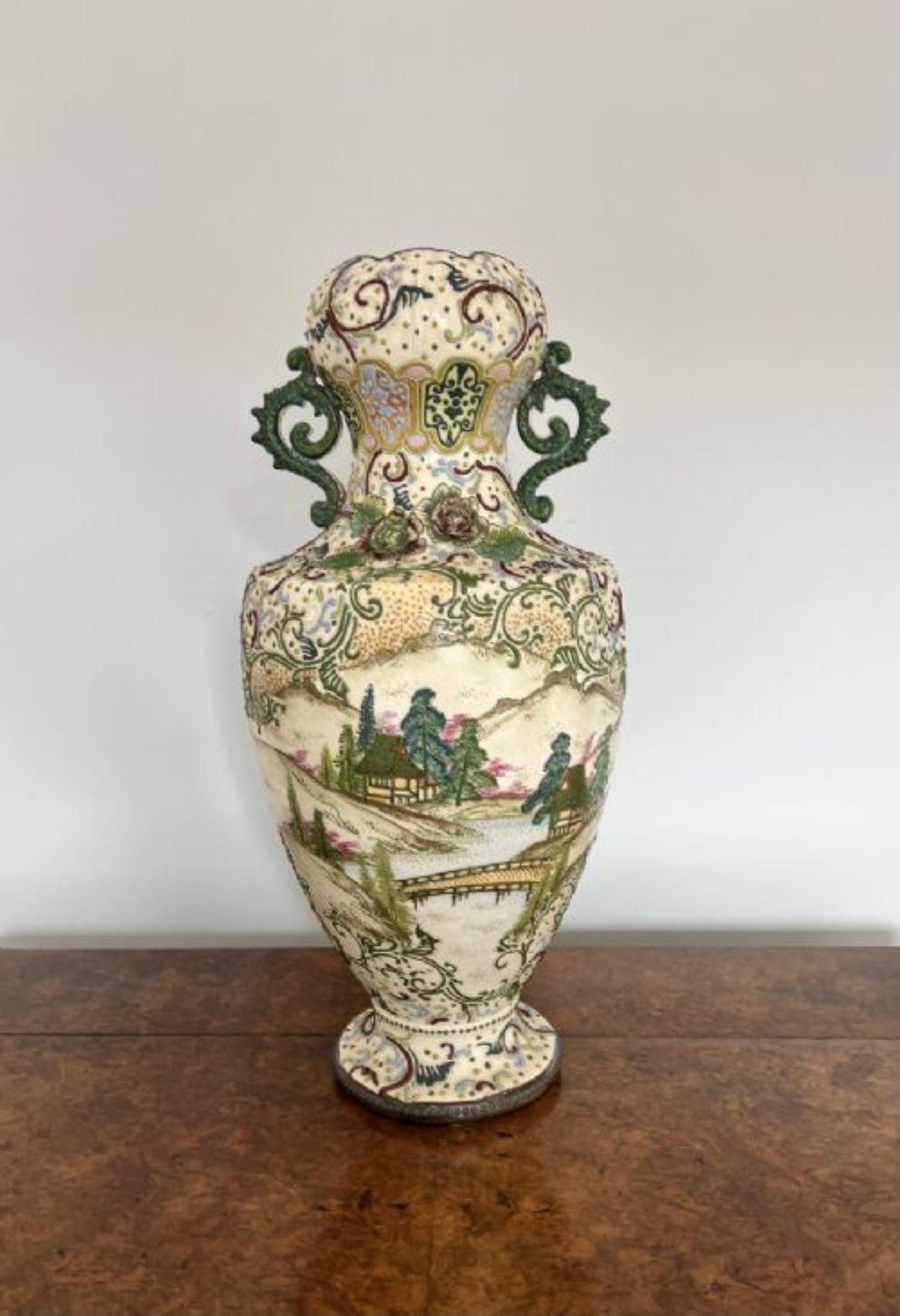 Large antique quality Satsuma vase having a large antique Japanese quality satsuma vase with quality hand painted decoration with scenes of trees, mountains, houses, bridges and scrolls in lovely green, purple, brown, blue and yellow colours with