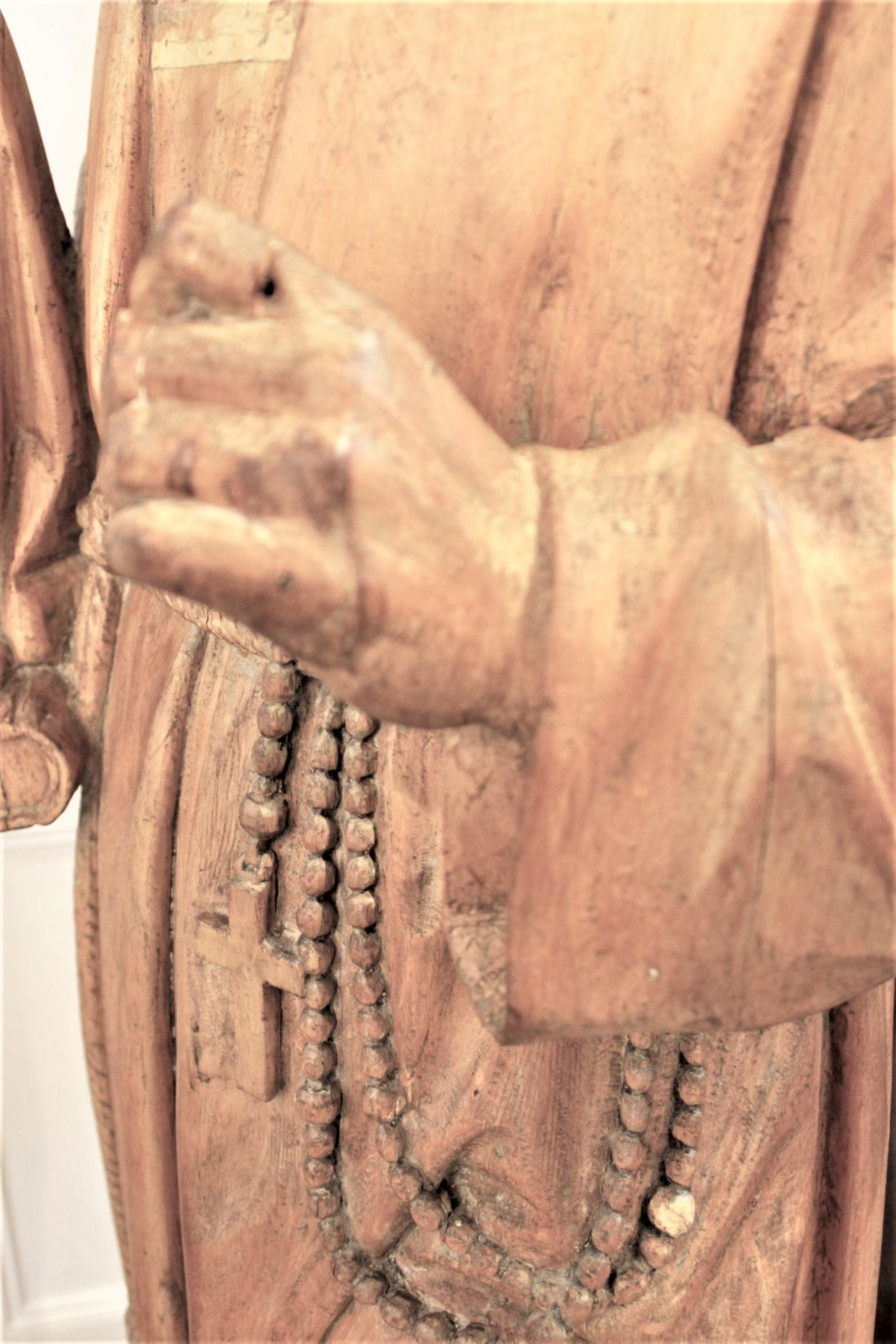 Grande sculpture canadienne ancienne en bois sculptée à la main représentant Saint Antoine et Jésus en vente 2