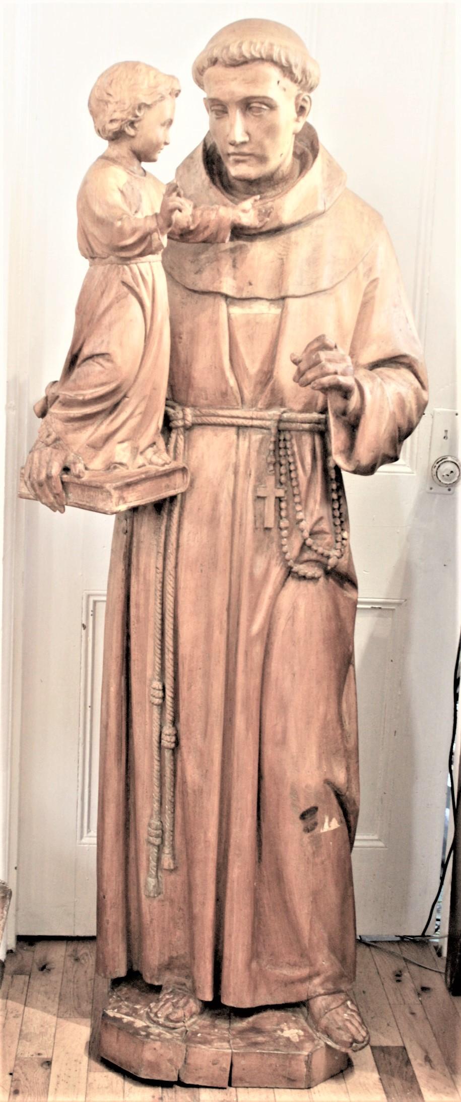 This very large and well executed hand carved pine sculpture was done is unsigned, but believed to have been done in Quebec Canada in approximately 1850 in the period Early Victorian style. The entire sculpture is done using a block of pine, which