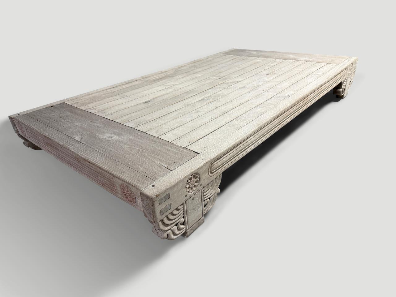 An impressive teak day bed that can be used as a regular bed frame or a statement piece pool side. Beautiful century old teak wood with lovely character and minimalist carving on this solid one of a kind piece. 

This day bed was sourced in the