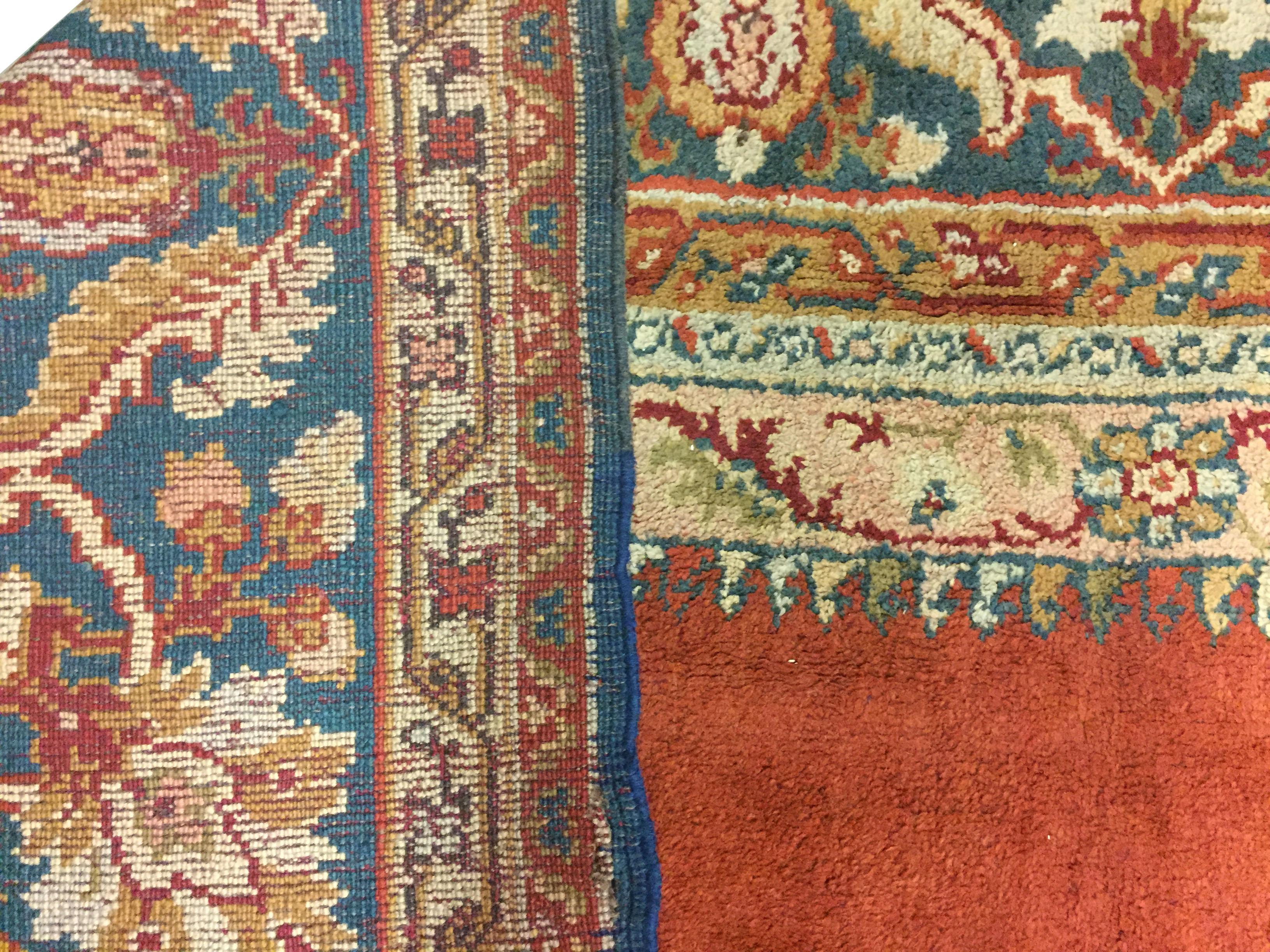 12'4 x 16'1. A Turkish Oushak style rug hand knotted in Europe probably Spain.
