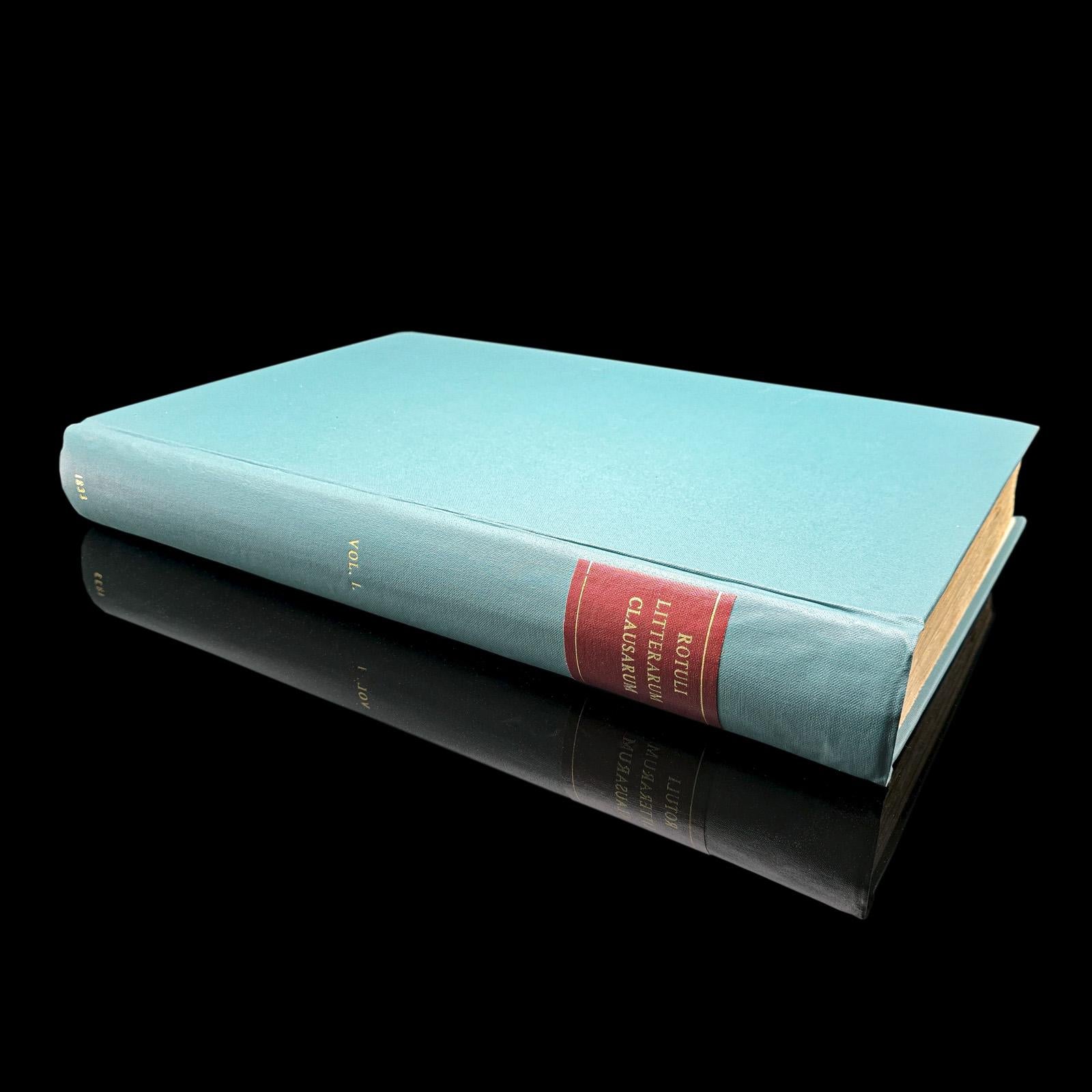 
This is a large antique reference book, Rotuli Litterarum Clausarum. Printed in Latin and English, a later-bound House of Commons record, dating to the William IV period, published 1833.

Full title: Rotuli Litterarum Clausarum In Turri Londinensi