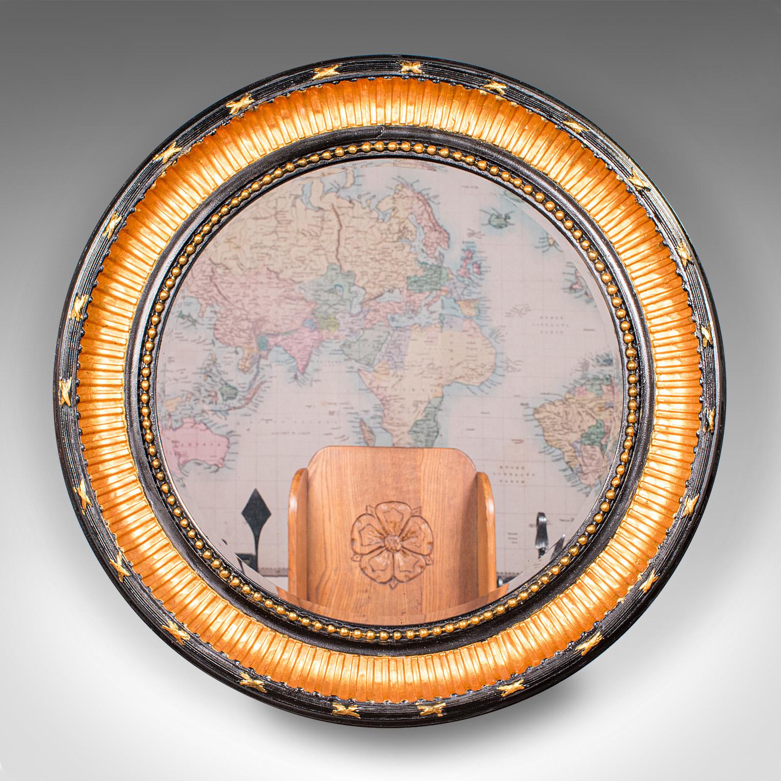 This is a large antique Regency revival mirror. An English, ebonised beech hall or overmantle mirror, dating to the Edwardian period, circa 1910. A bold and elegant decorative piece, showcasing classic revival taste and fine craftsmanship.

Striking