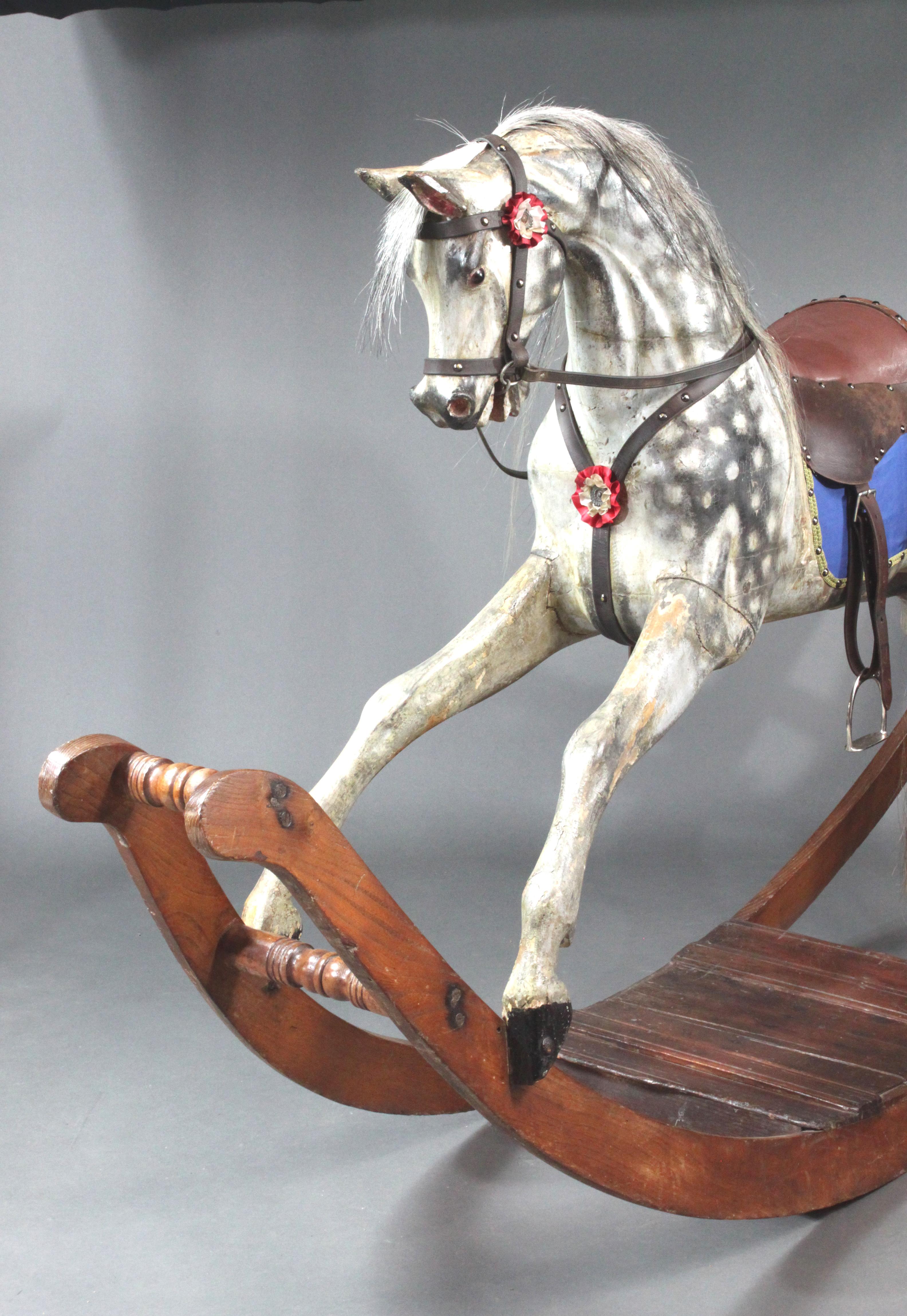 Large rocking horse on curved rockers attributed to Lines Brothers; the original paint has been retained with a small amount of sensitive restoration; the mane and tail have been replaced as has some of the saddlery using old supple leather.
Many