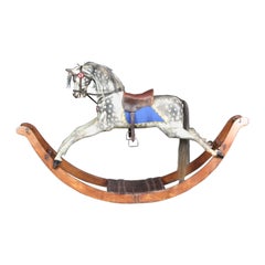 Grand cheval à bascule ancien sur roulettes en bois incurvées par Lines Brothers