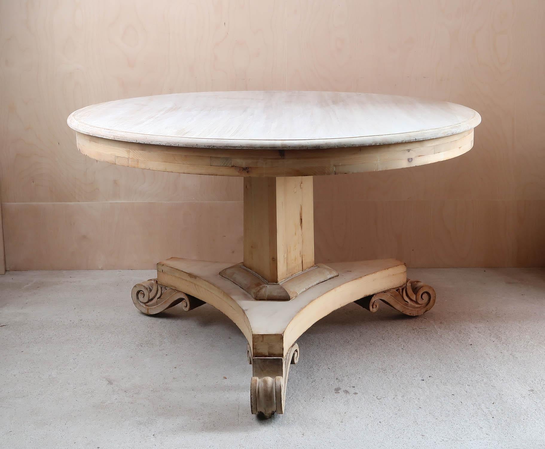Fabulous large round Georgian table. 

Made from pine and bleached tropical hardwood.

Great simple lines. 

I particularly like the bold shaped feet

I have chosen not to lacquer or wax the table.

Original brass casters

Sturdy construction.






