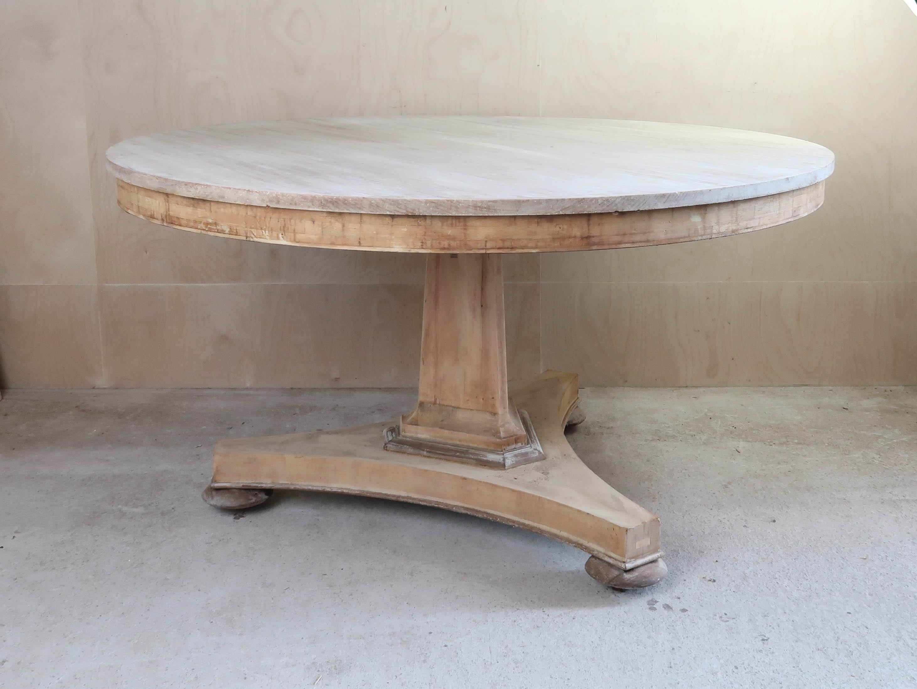 Fabulous large round Georgian table. 

Made from bleached topical hardwood and pine

Great simple lines. 

I have chosen not to lacquer or wax the table.

Original castors. Sturdy construction.

Free UK shipping





