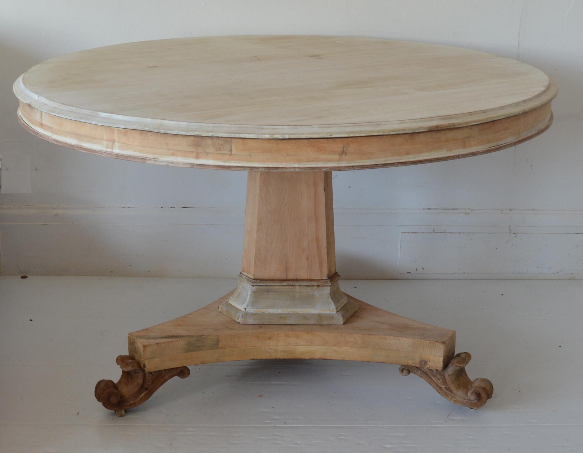 Fabulous large round table. Made from bleached Honduras mahogany and pine.

Original castors and hardware. The top does tip.

Great simple lines. I particularly like the carved detail on the feet.

I have chosen not to lacquer or wax the