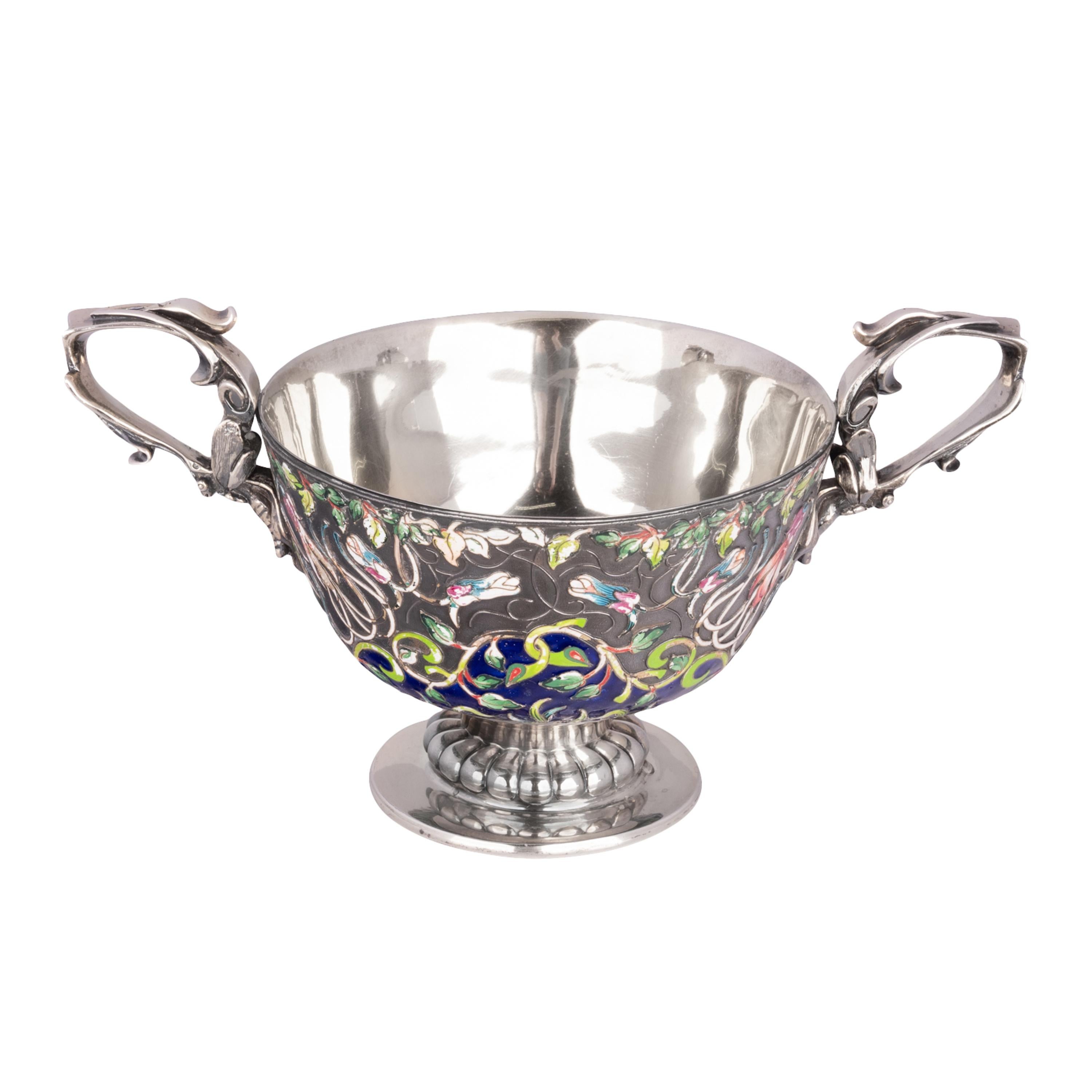 A large antique Imlerial Russian twin handled silver cloisonne bowl, Pavel Ovchinnikov, Moscow, 1898. Silver weight 24.5 oz (695 grams).
Ovchinnikov is recognized as one of Russia's most famous enamellers, he produced incredible objects to rival the