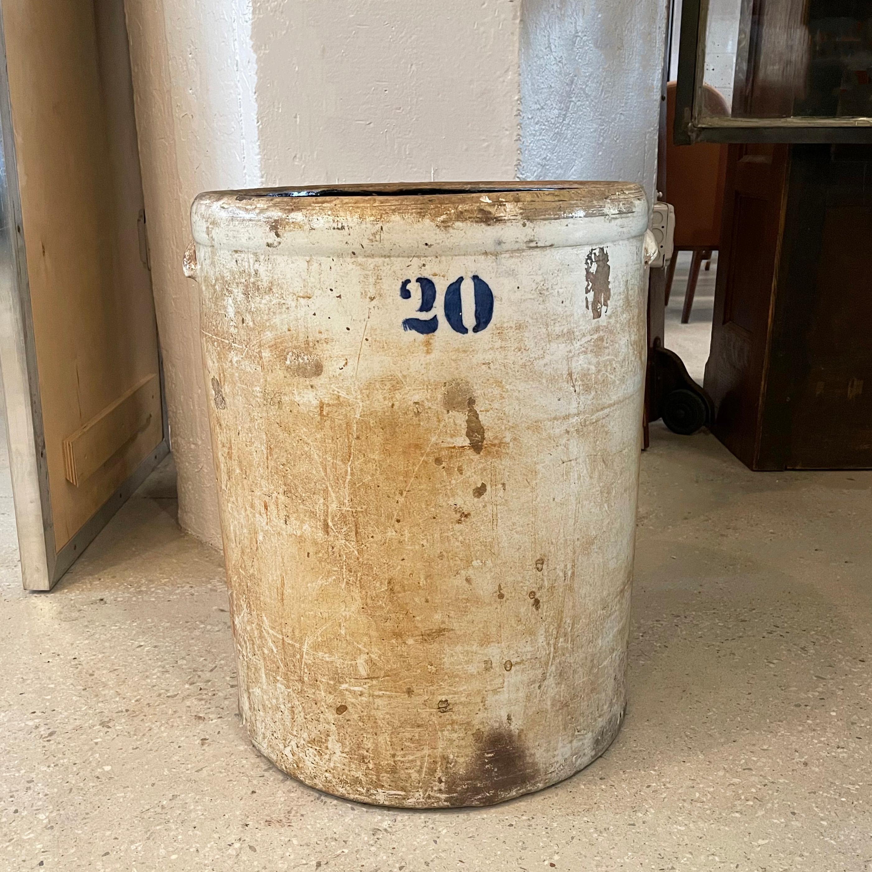 Large, 19th century, 20 gallon, rustic, stoneware, pickling crock vessel with handles.