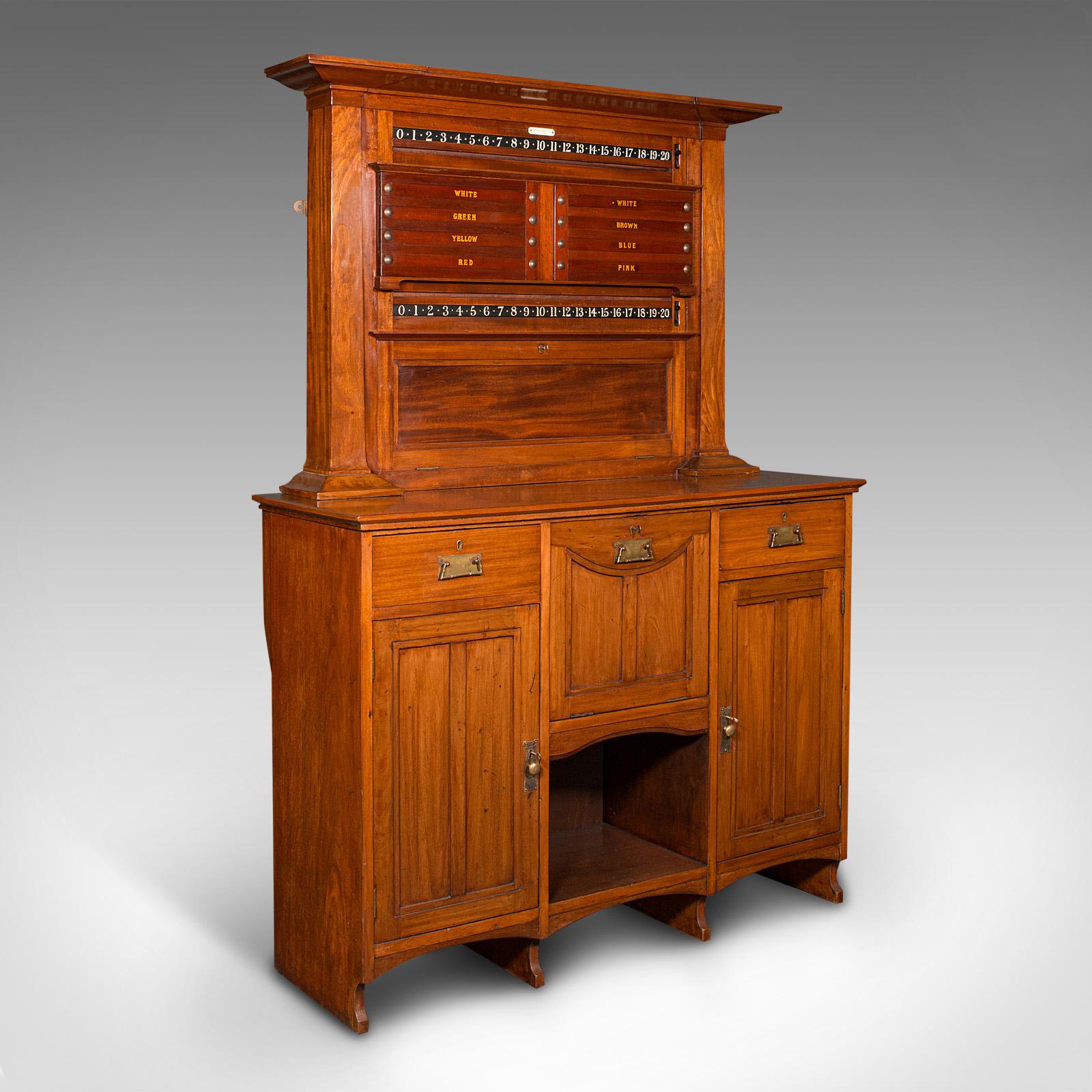 This is a large antique score cabinet. An English, walnut billiard and pool scoreboard by Thurston, dating to the Edwardian period, circa 1910.

Of impressive proportion and superb decorative appeal
Displays a desirable aged patina and in very
