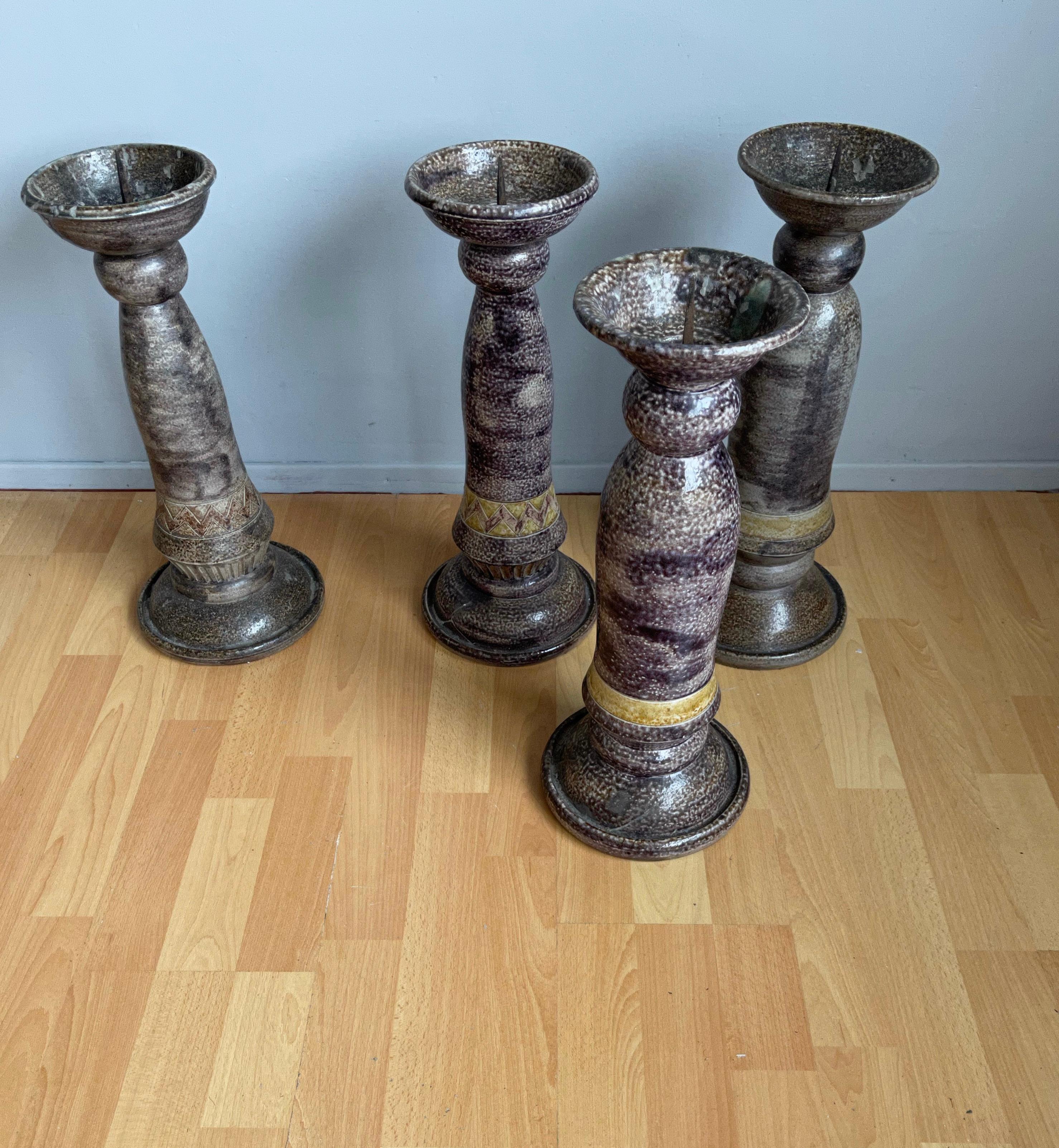 Stunning group of early 20th century church candleholders.

If you are looking for stylish and practical ecclesiastical antiques, then this set of four large church candlesticks could be gracing your home soon. With their unique look and feel, this