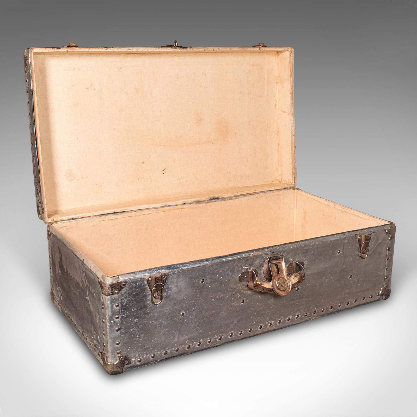 
This is a large antique shipping chest. A Continental, aluminium travelling trunk, dating to the Edwardian period, circa 1910.

Distinctive aluminium appearance, with a useful proportion
Displaying a desirable aged patina throughout
Aluminium